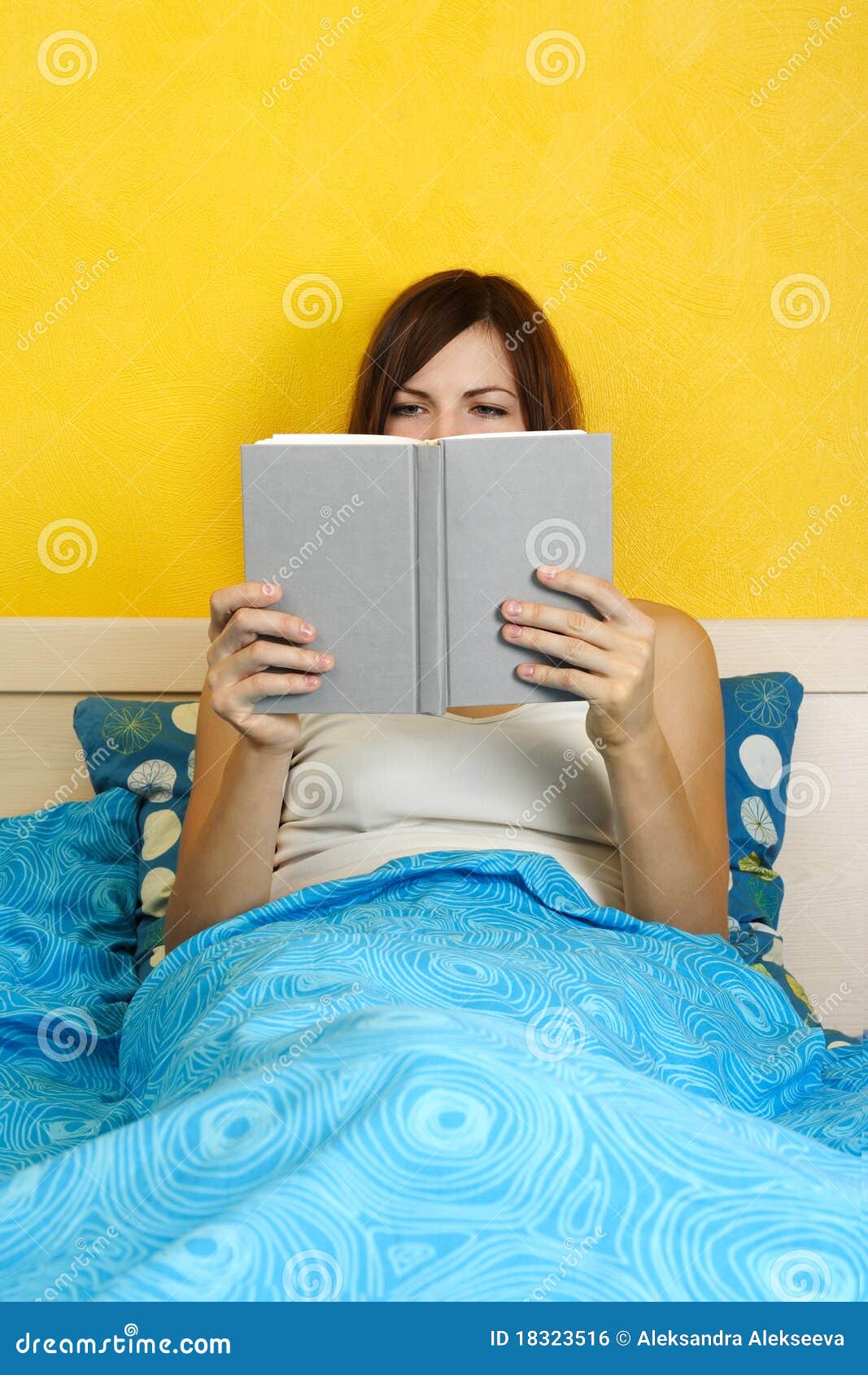 Woman Sitting on Bed and Reading Book Stock Photo Image of hand, open