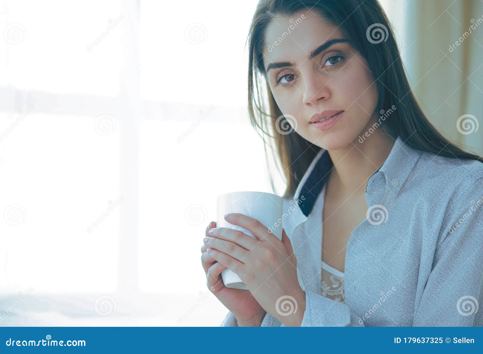 Woman Sitting in Bed Reading a Book and Having Breakfast Stock Image ...