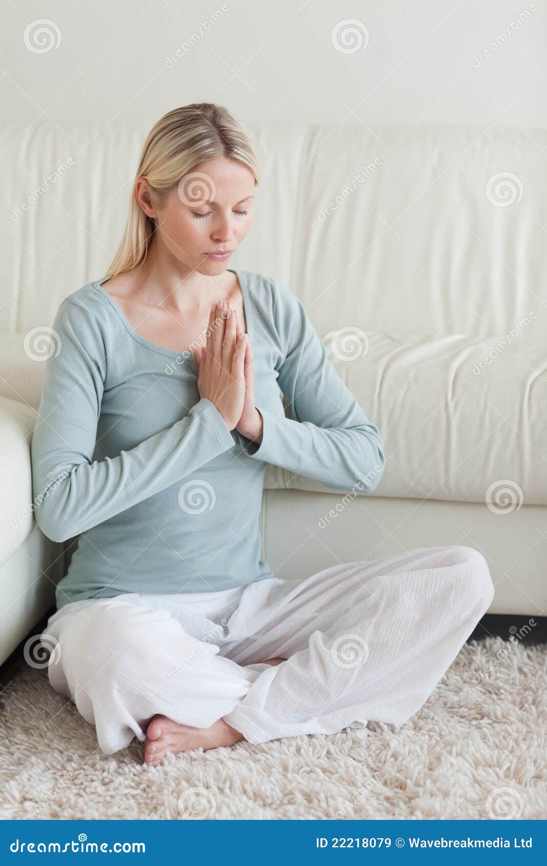 Woman Sitting on the Carpet Doing Yoga Stock Image Image of couch