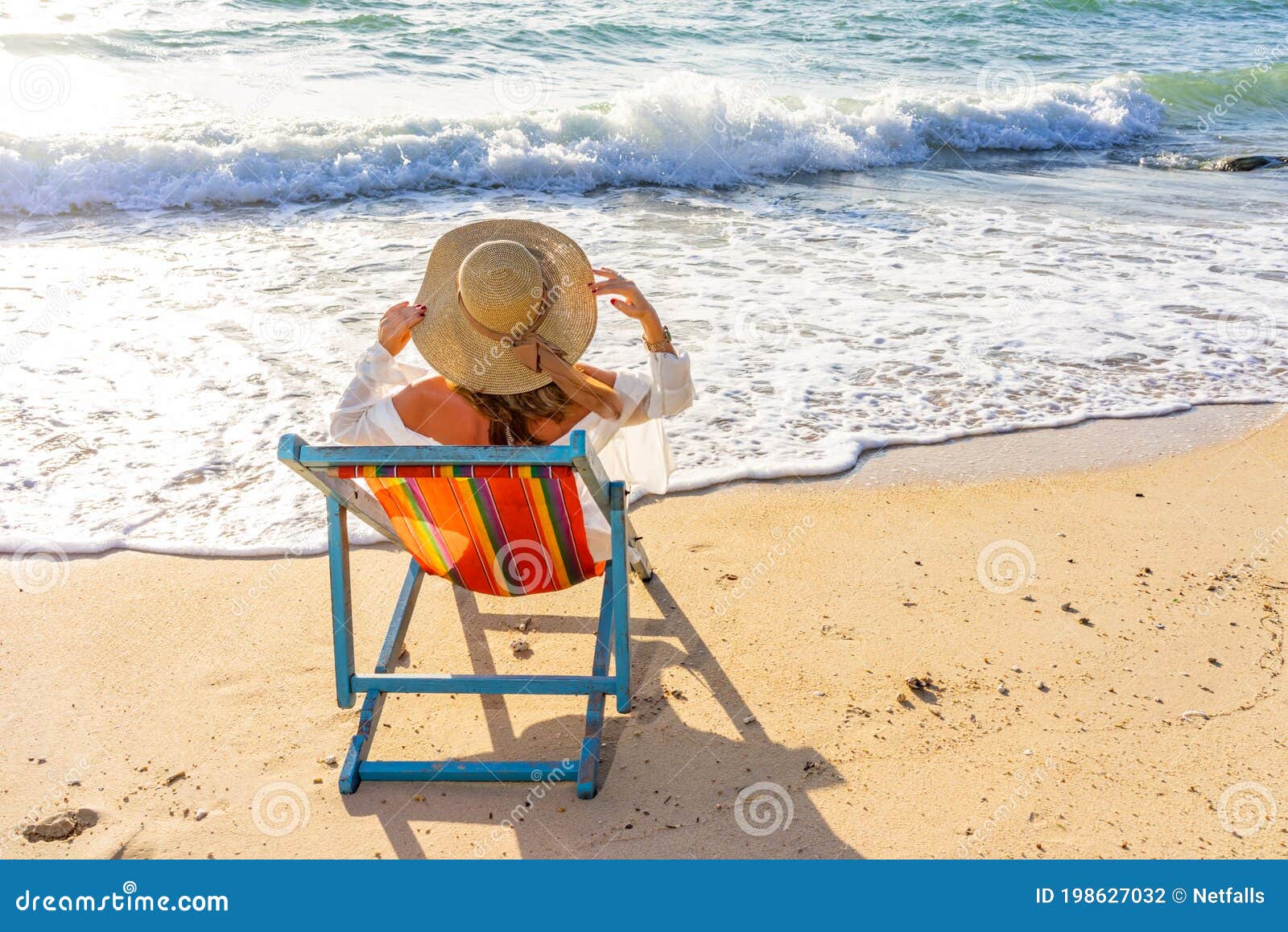 Woman Sitting On A Chair At The Beach Stock Photo Image Of Lying Resort