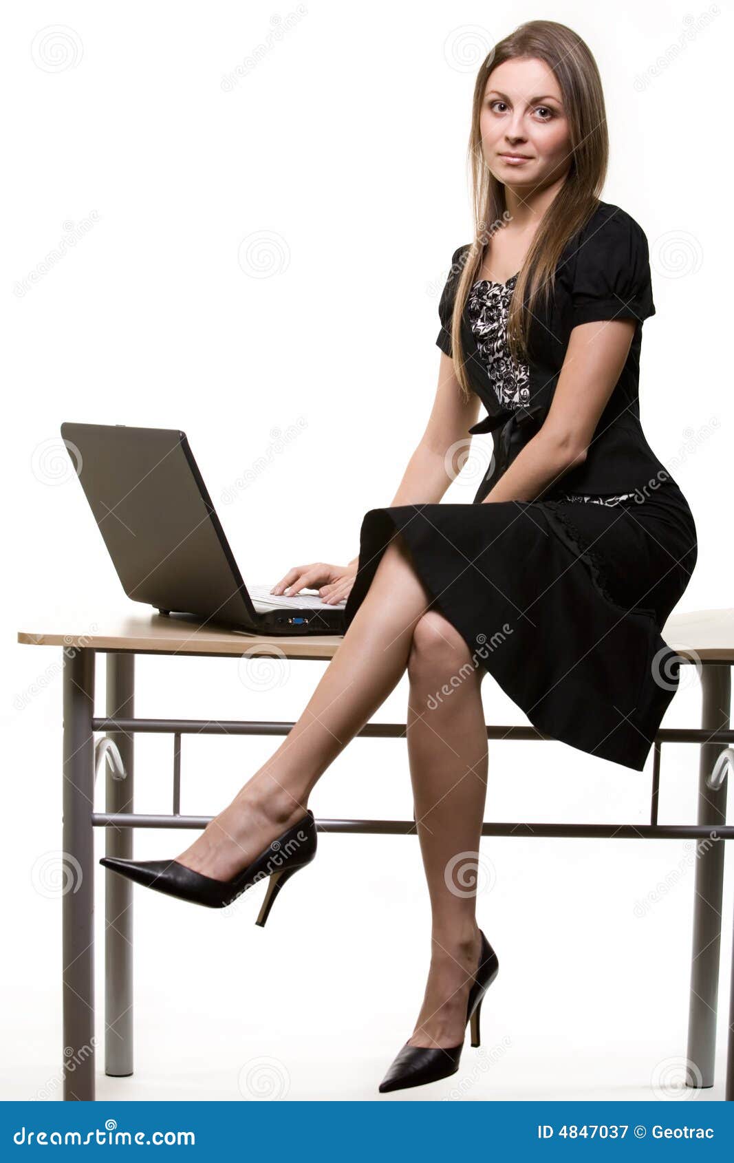 Woman sitting on desk stock image. Image of person, attractive