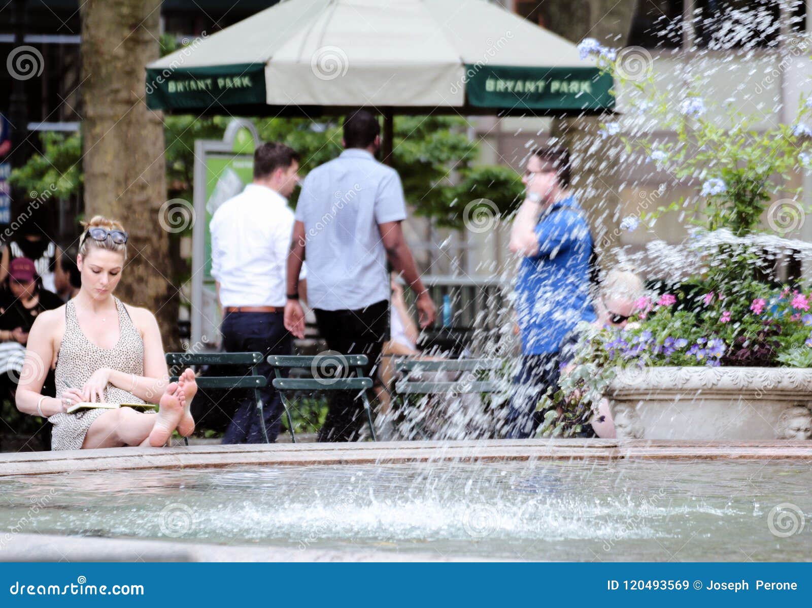 https://thumbs.dreamstime.com/z/woman-sitting-fountain-bryant-park-woman-sitting-fountain-bryant-park-relaxing-120493569.jpg?ct=jpeg