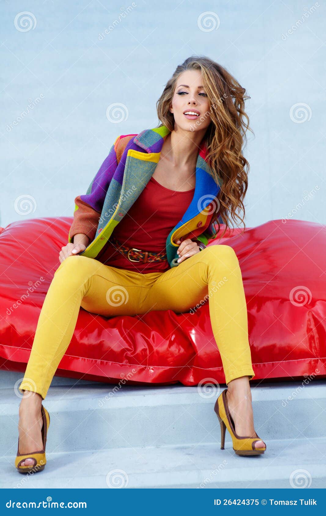 Woman Sitting on a Red Cushion Stock Image Image of beautiful, slim