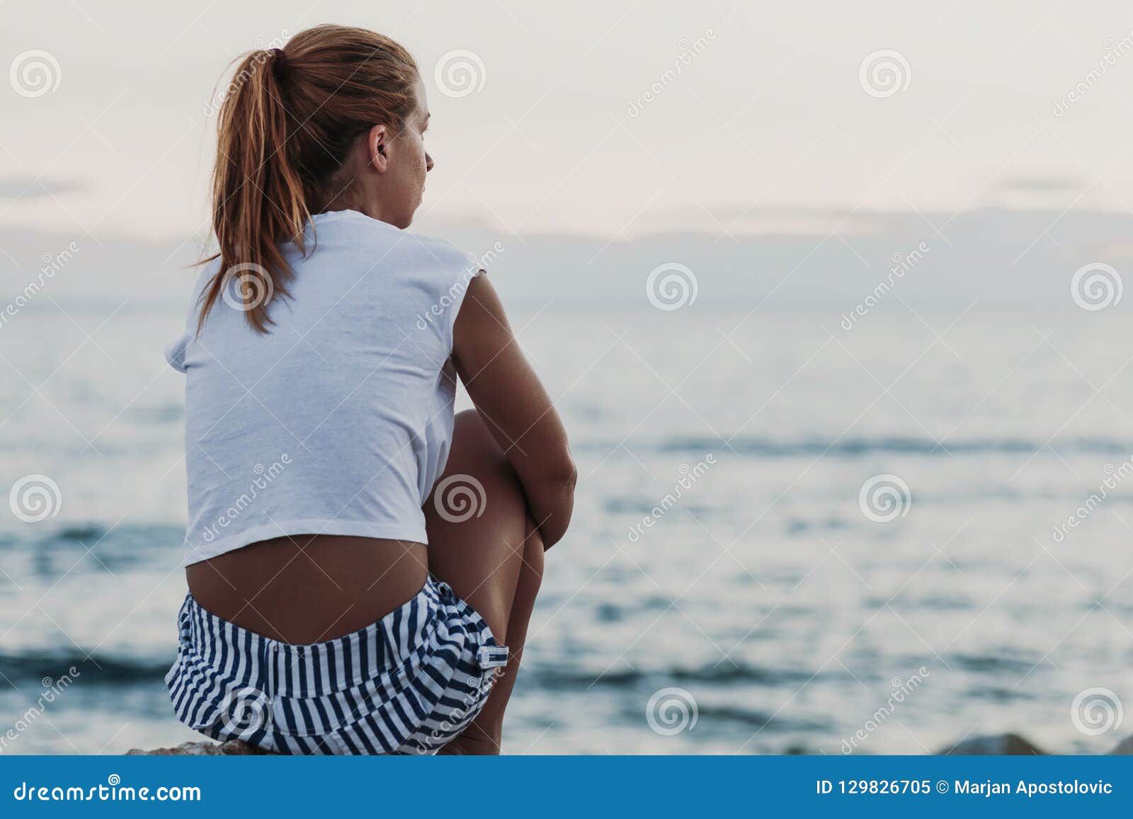 Woman Sitting On The Rock Looking To The Sea Stock Image Image Of Relax Adult