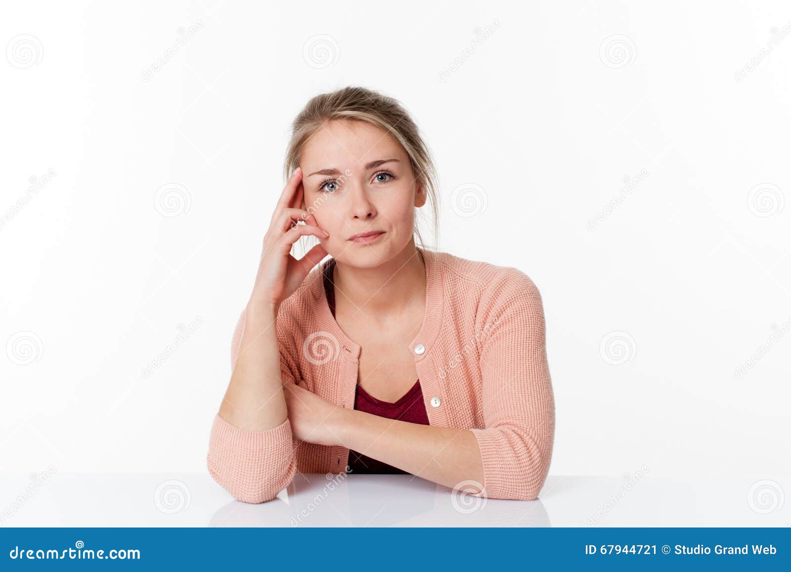 woman sitting at sparse desk for patience and quietness