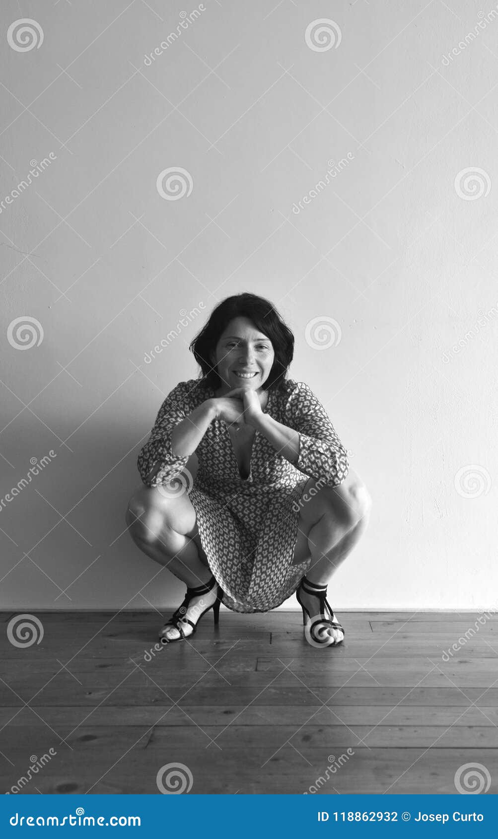 Woman Sitting Squatting in Front of Ura Wall Stock Photo - Image of