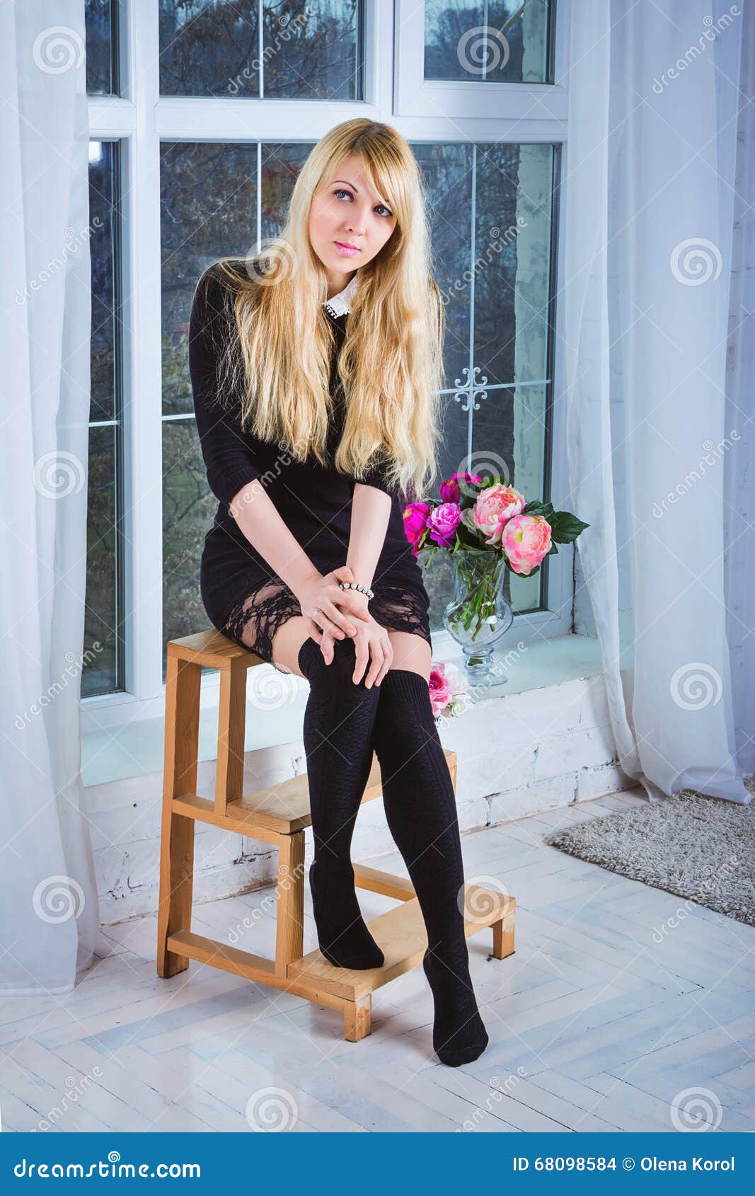 Woman Sitting on the Stepladder Stock Photo - Image of skirt, fashion ...