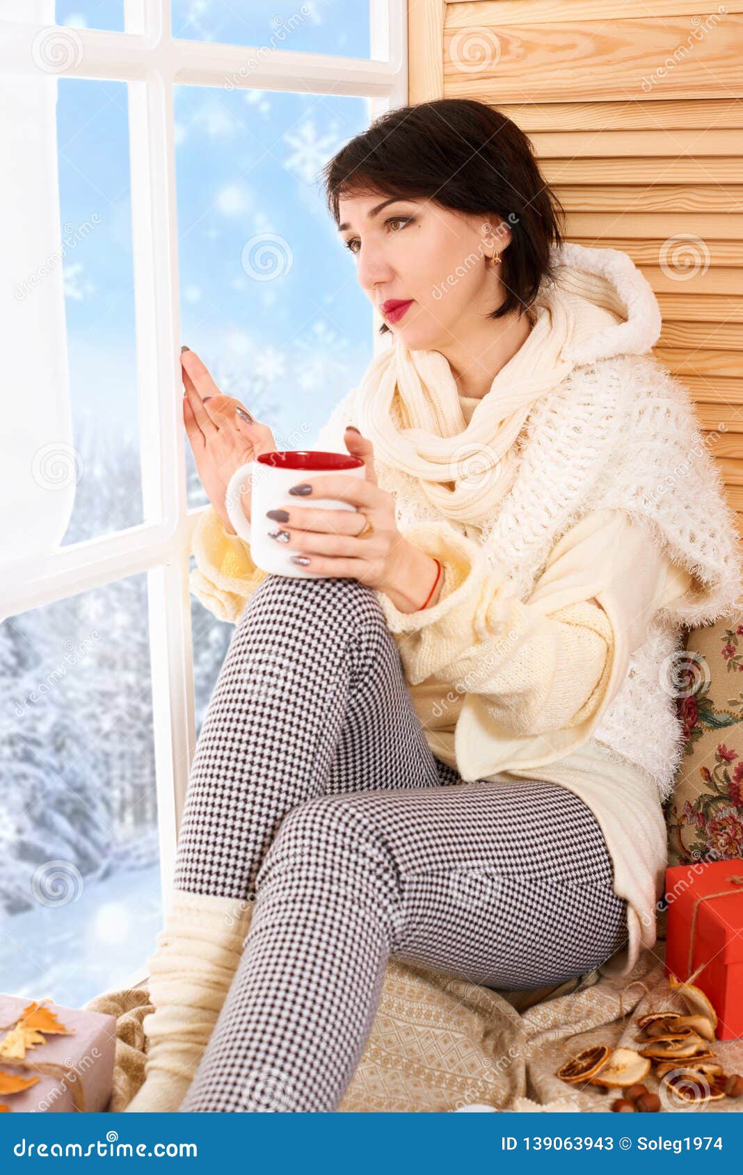 Woman is Sitting with Tea Cup on a Window Sill. Beautiful View Outside ...