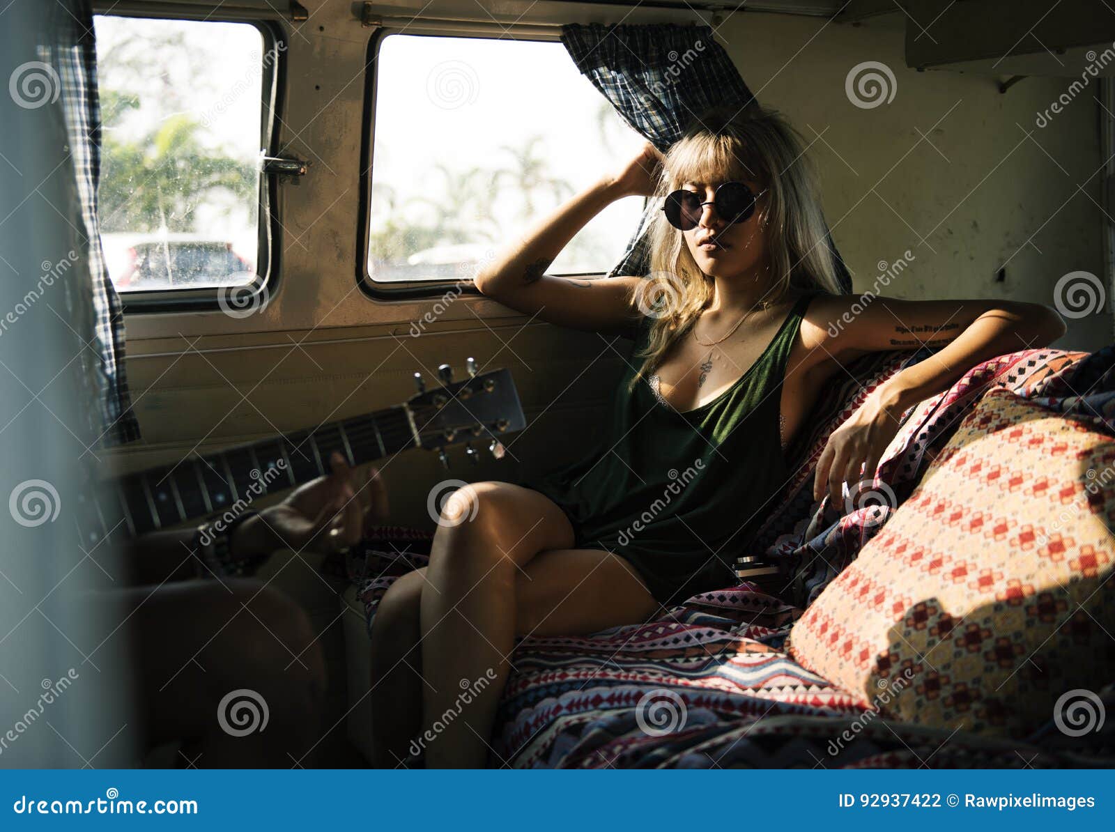 woman sitting in a van roadtrip