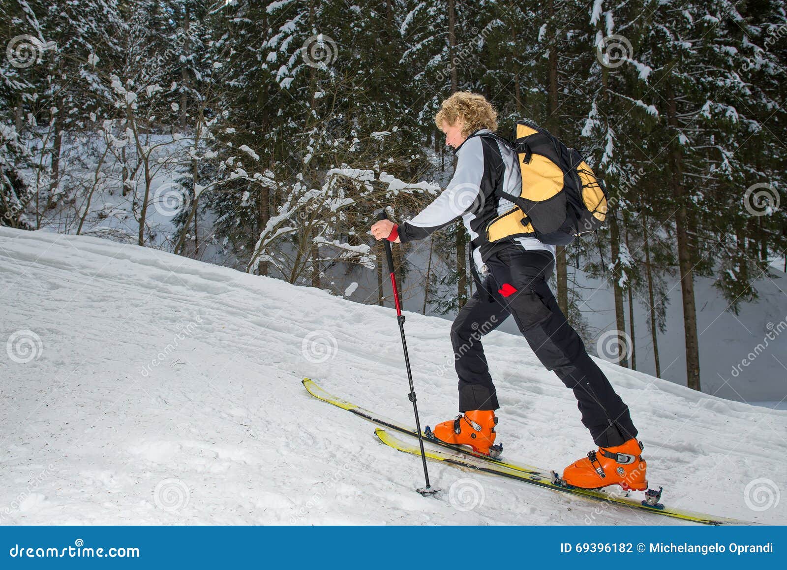 Woman With Ski Uphill Climbing Stock Photo Image 69396182 throughout Elegant  how to ski uphill regarding Your house