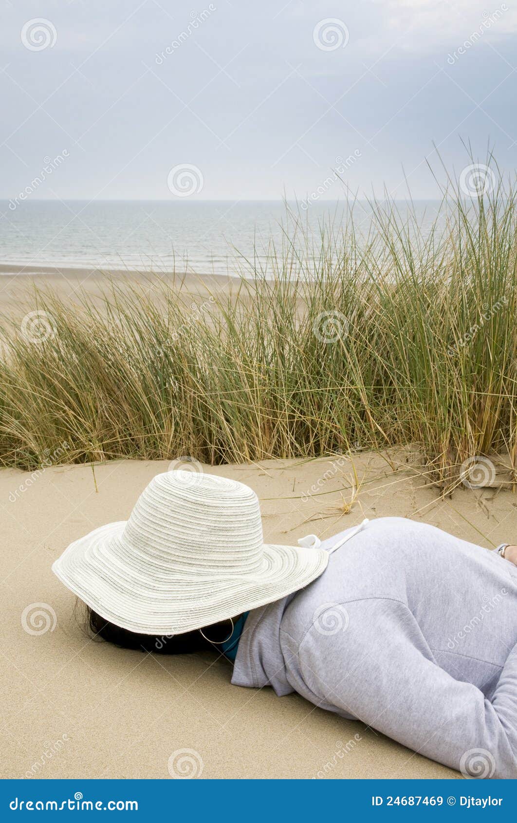 Woman sleeping on beach stock image. Image of sand, coast 24687469
