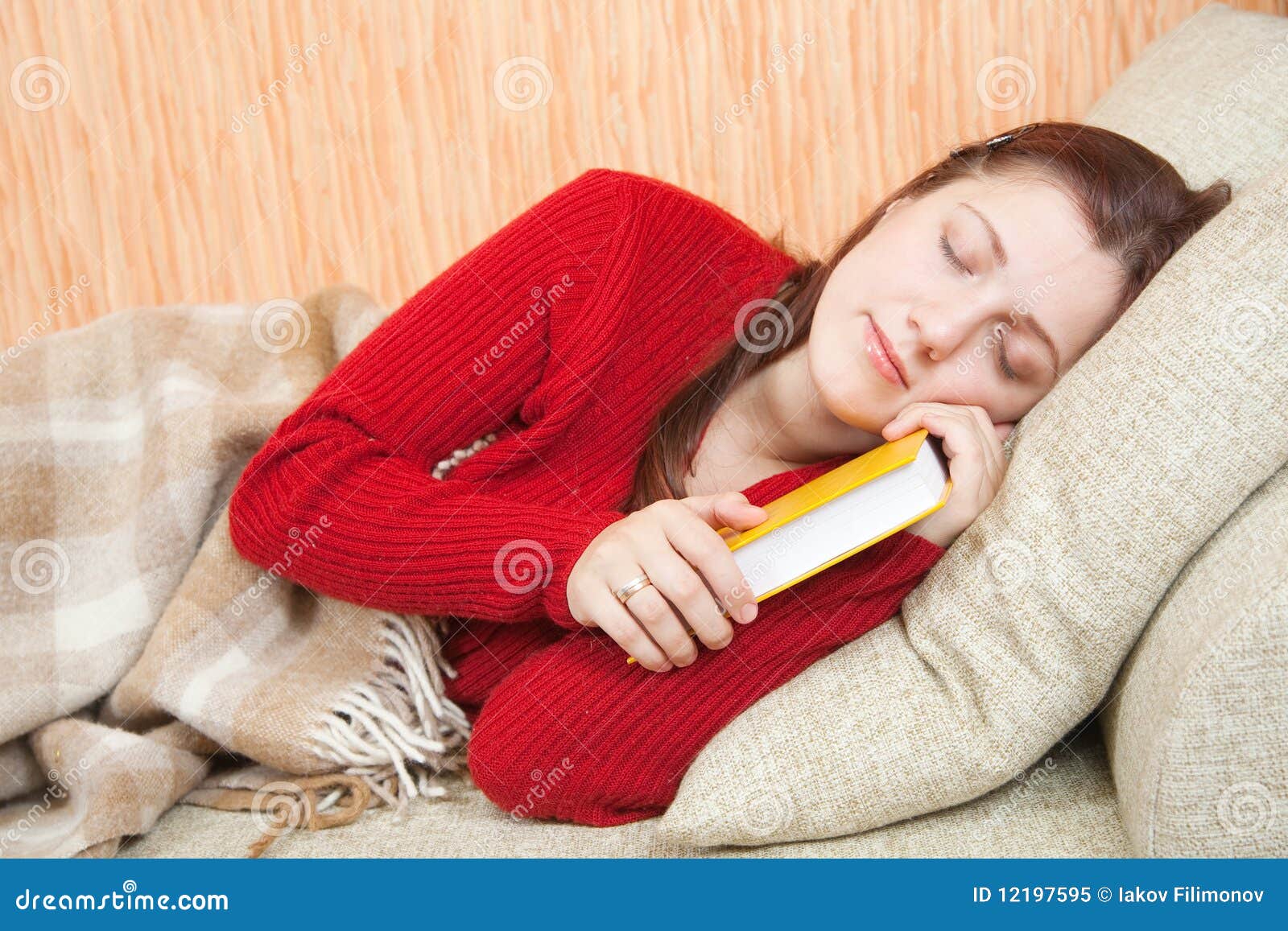 Woman sleeps on sofa stock image. Image of looking, leisure 12197595