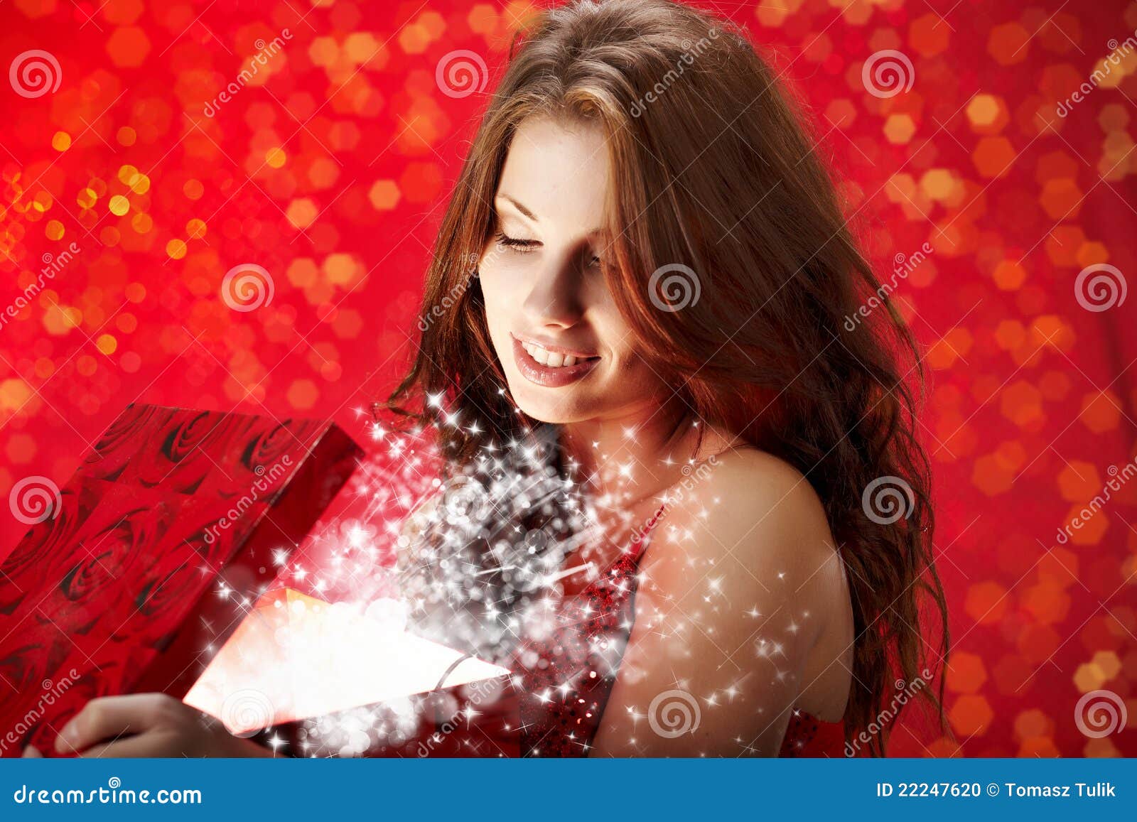 Woman Smiles and Holding a Magic Gift in Packing Stock Photo Image of