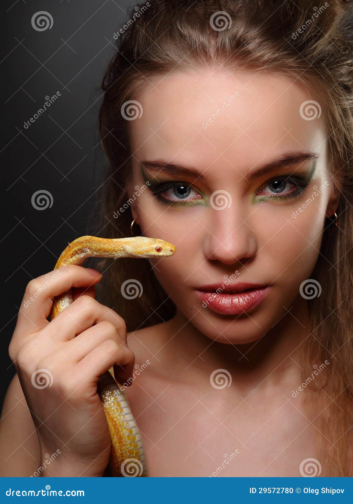 Woman with snake stock photo. Image of hairstyle, person - 29572780