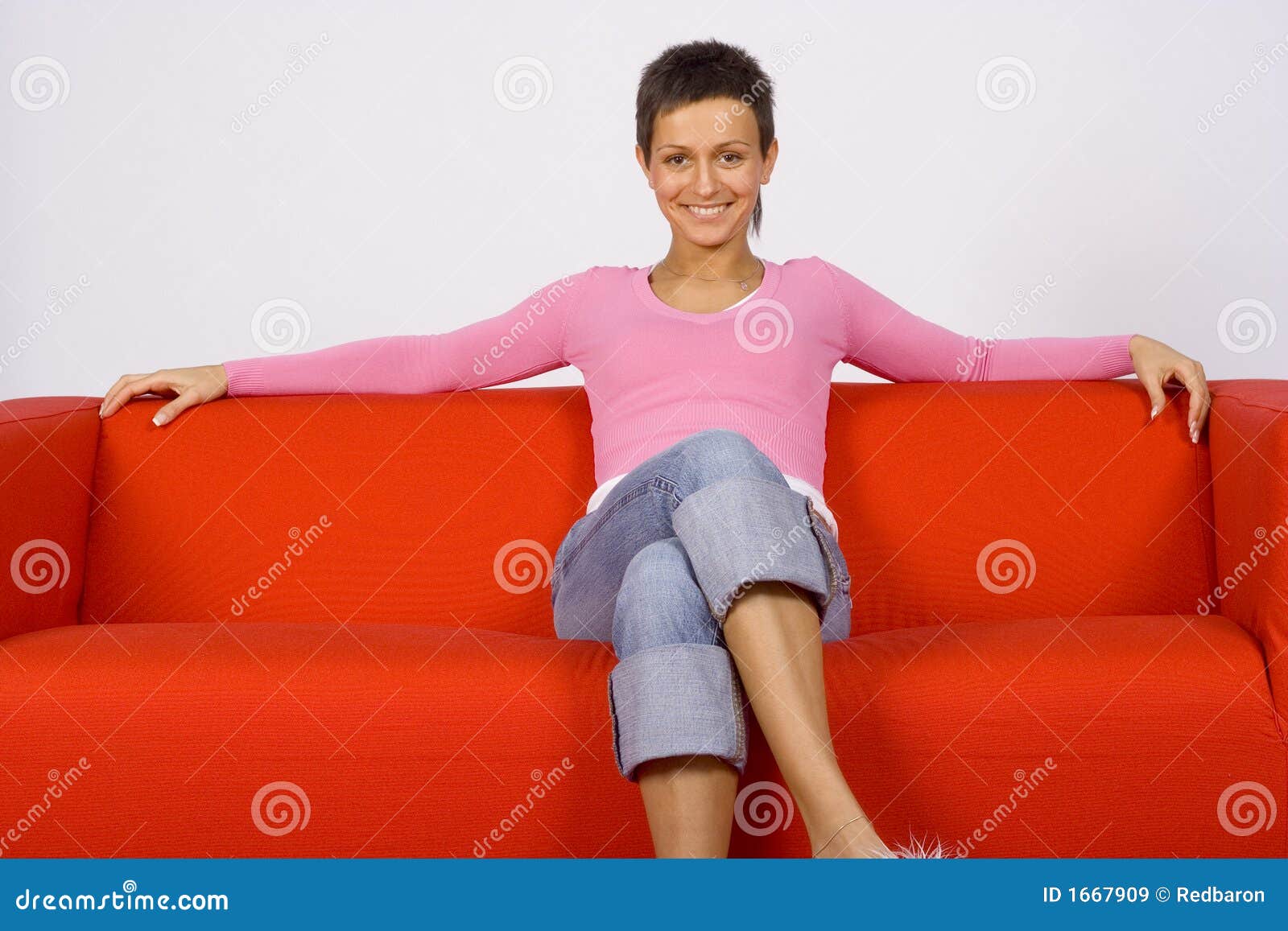 Woman on the sofa stock image. Image of room, break, relax 1667909