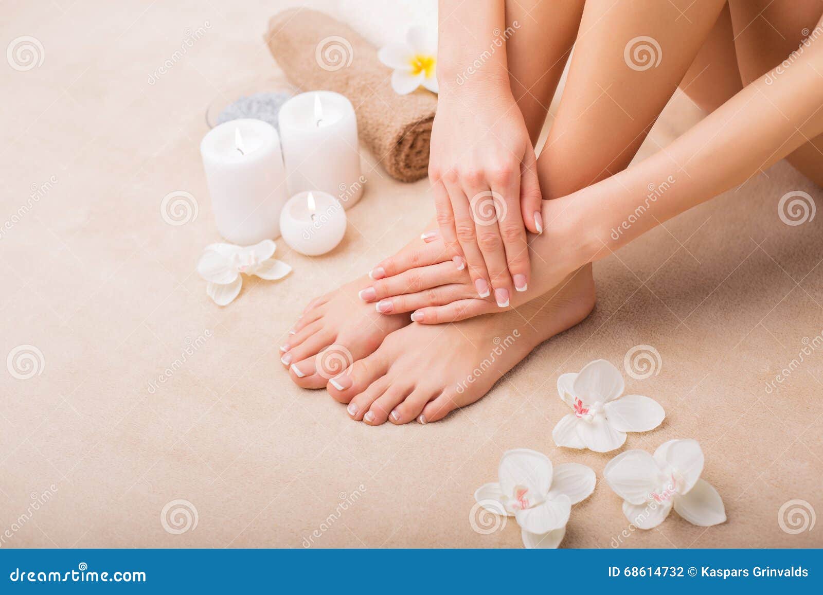 woman at spa with done manicure and pedicure
