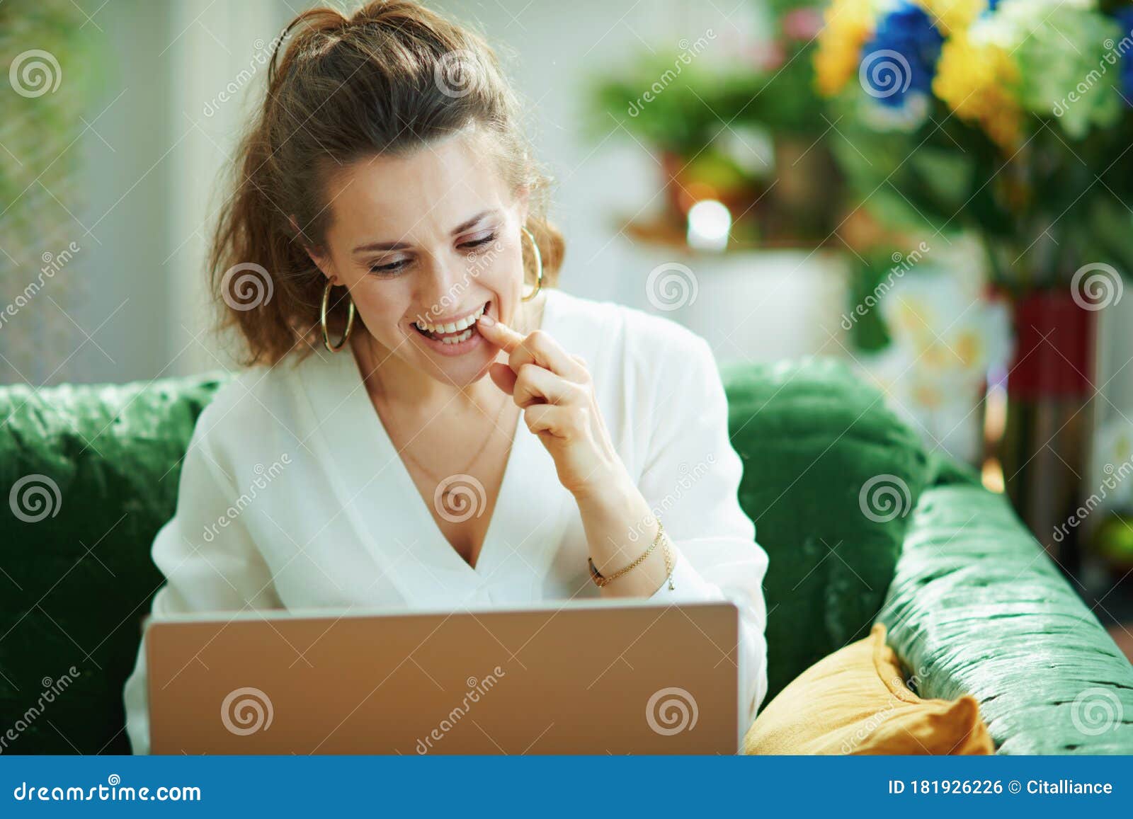 woman speaking with dentist in modern living room in sunny day