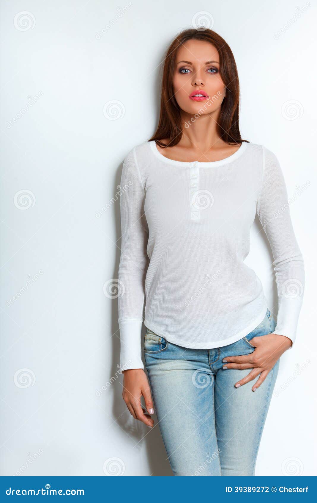 Woman standing near wall stock photo. Image of perfection - 39389272