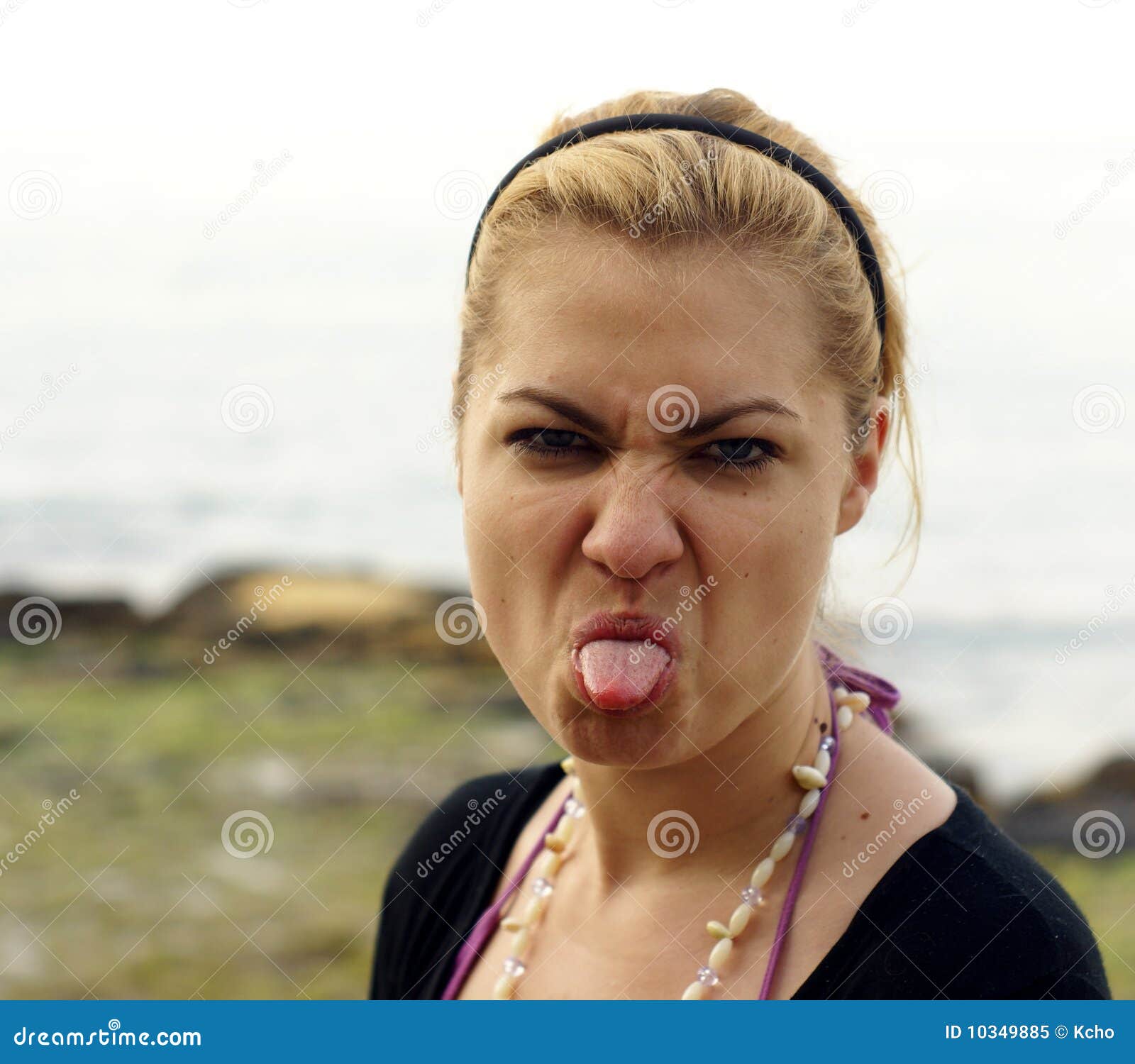 Tongue out sticking woman Beckwith