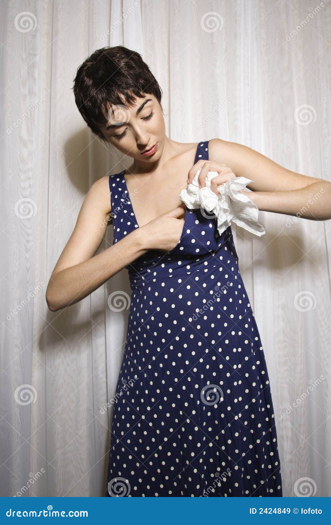 Woman stuffing bra. stock image. Image of glamor, clothing - 2424849