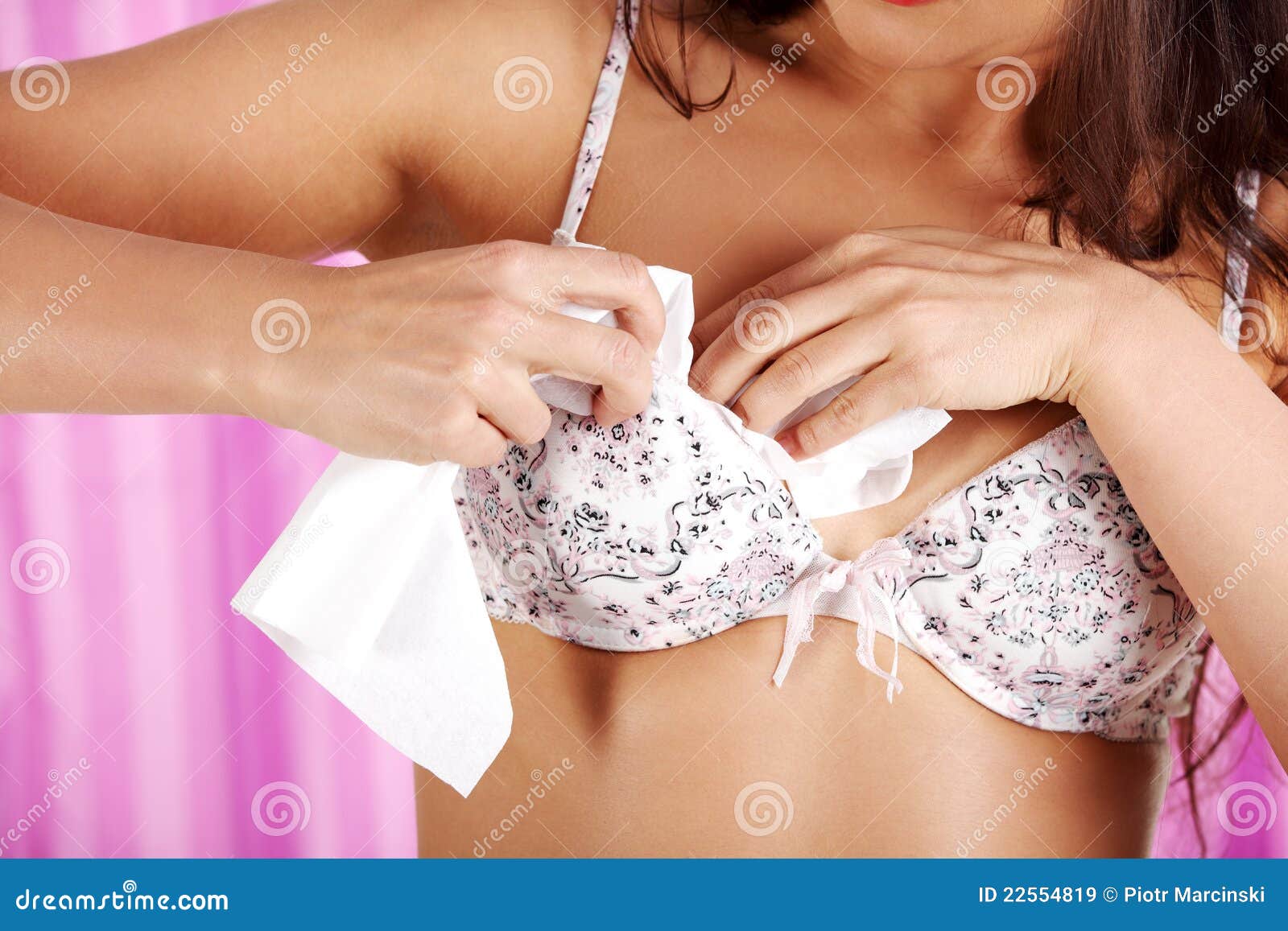 Woman Stuffing Bra with Tissue Stock Image - Image of figure