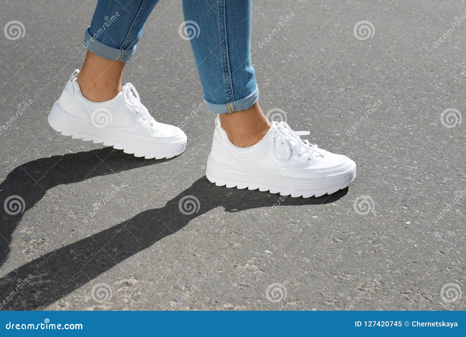 Woman in Stylish Sneakers Walking Outdoors Stock Image - Image of legs ...