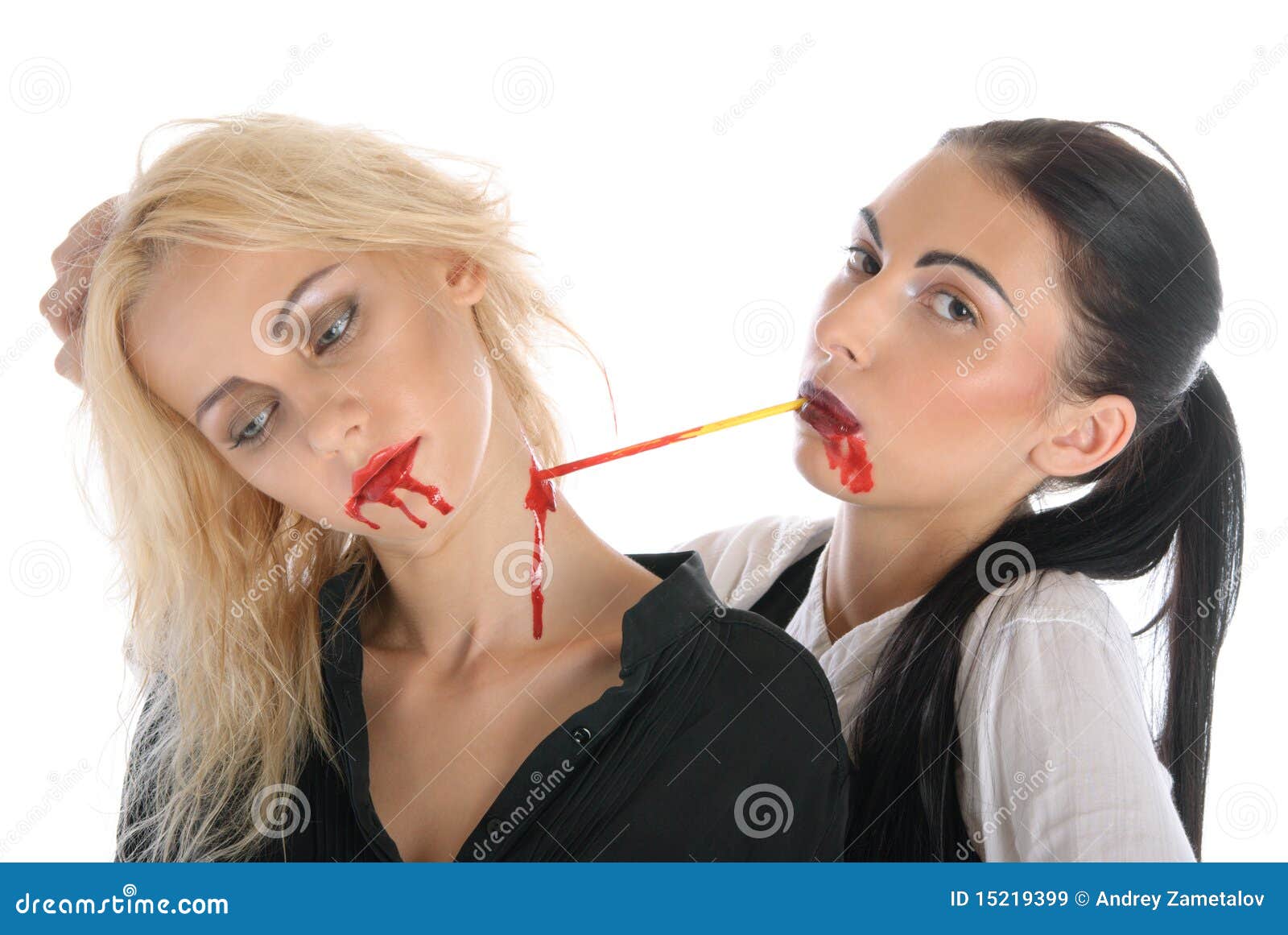 Woman Sucks Blood From Neck Of Other Woman Royalty Free