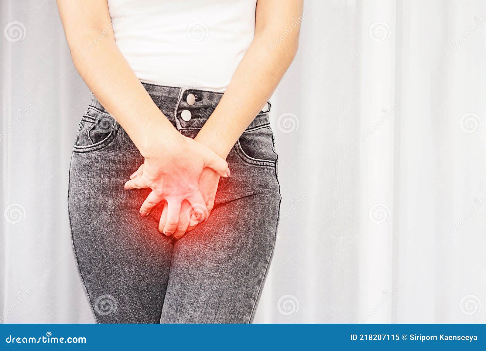 woman suffering from pain, itchy crotch hand holding her burning  vaginal caused by bladder infections or cystitis