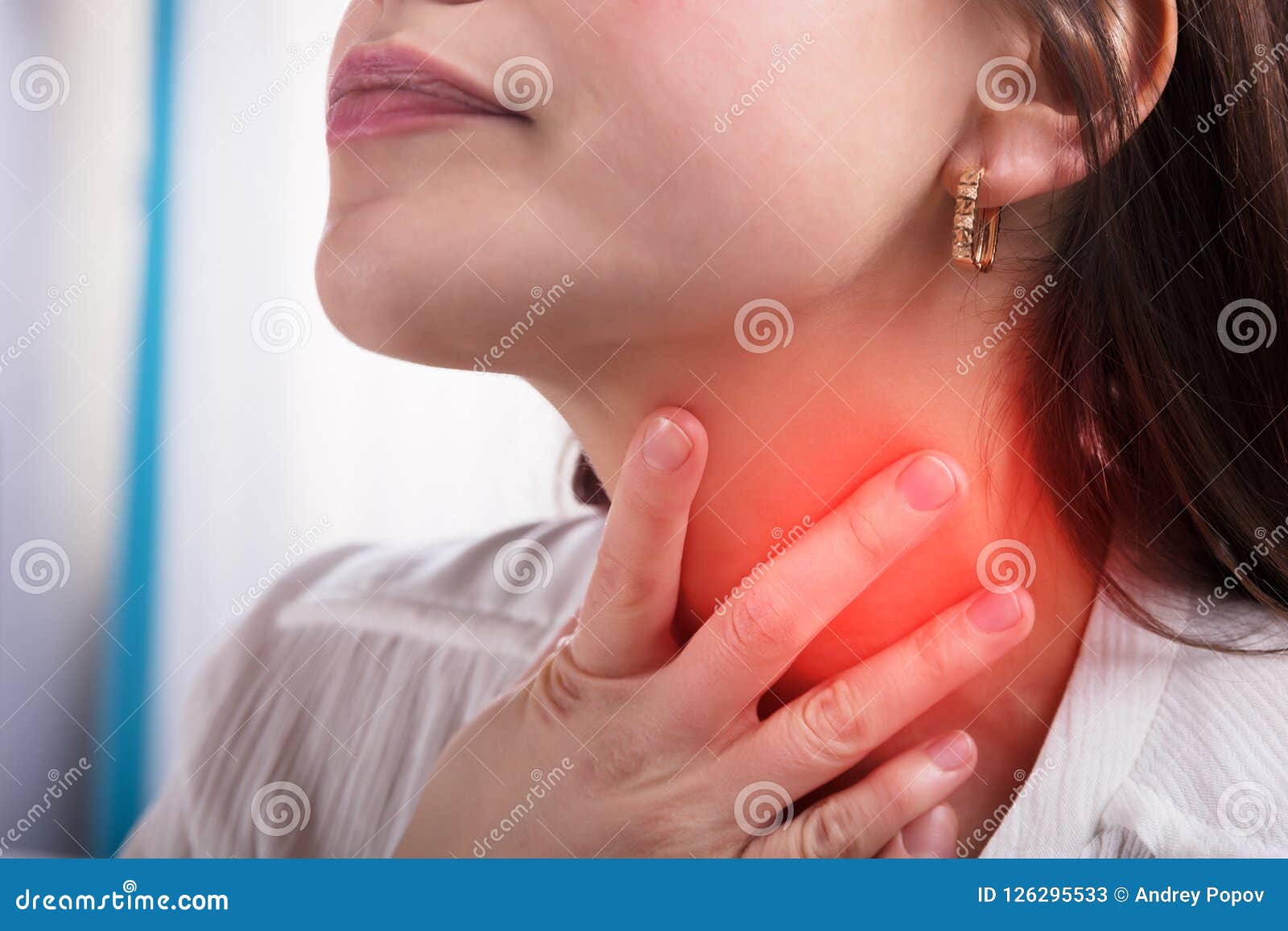 woman suffering from sore throat