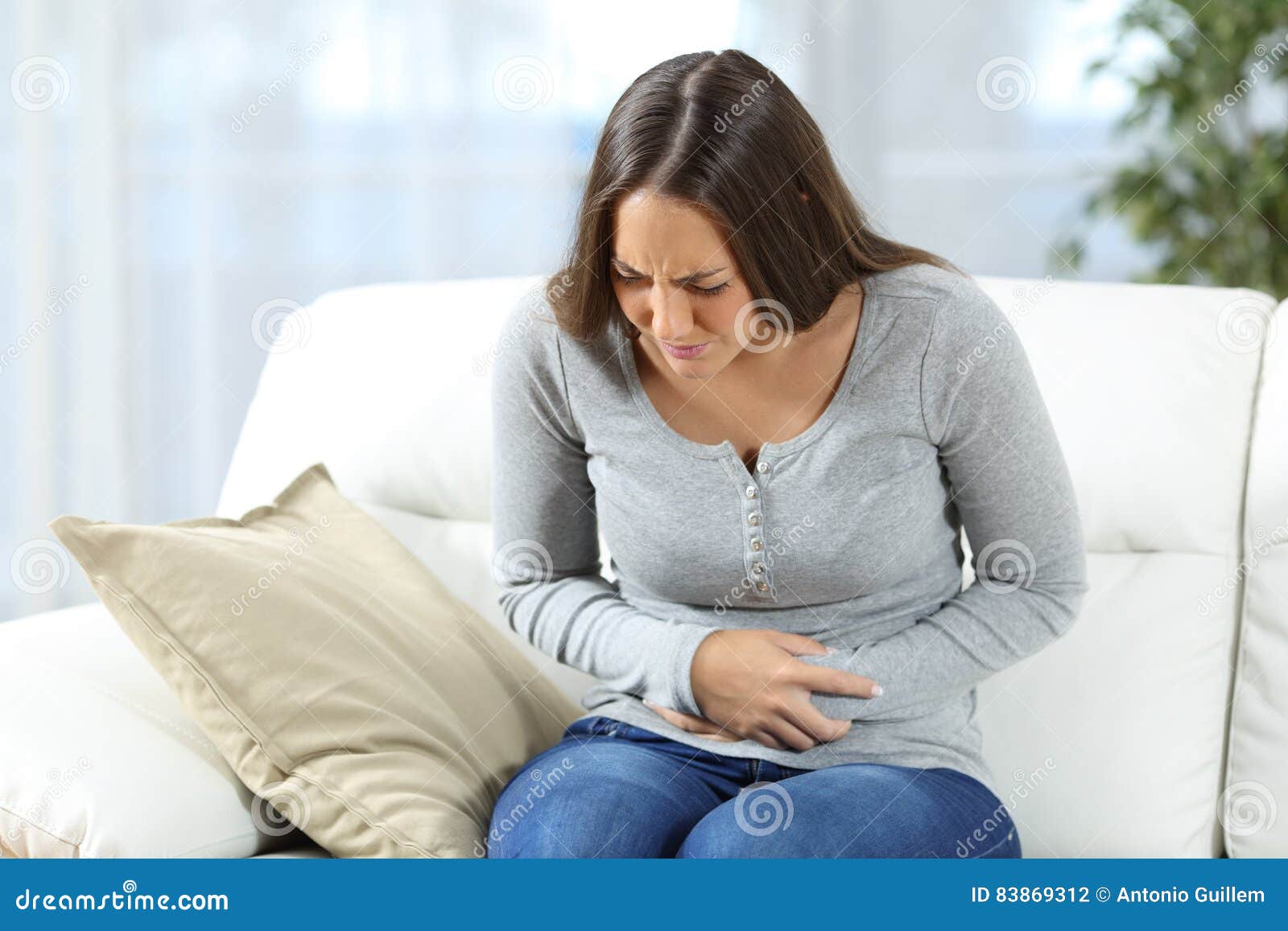 woman suffering stomach ache