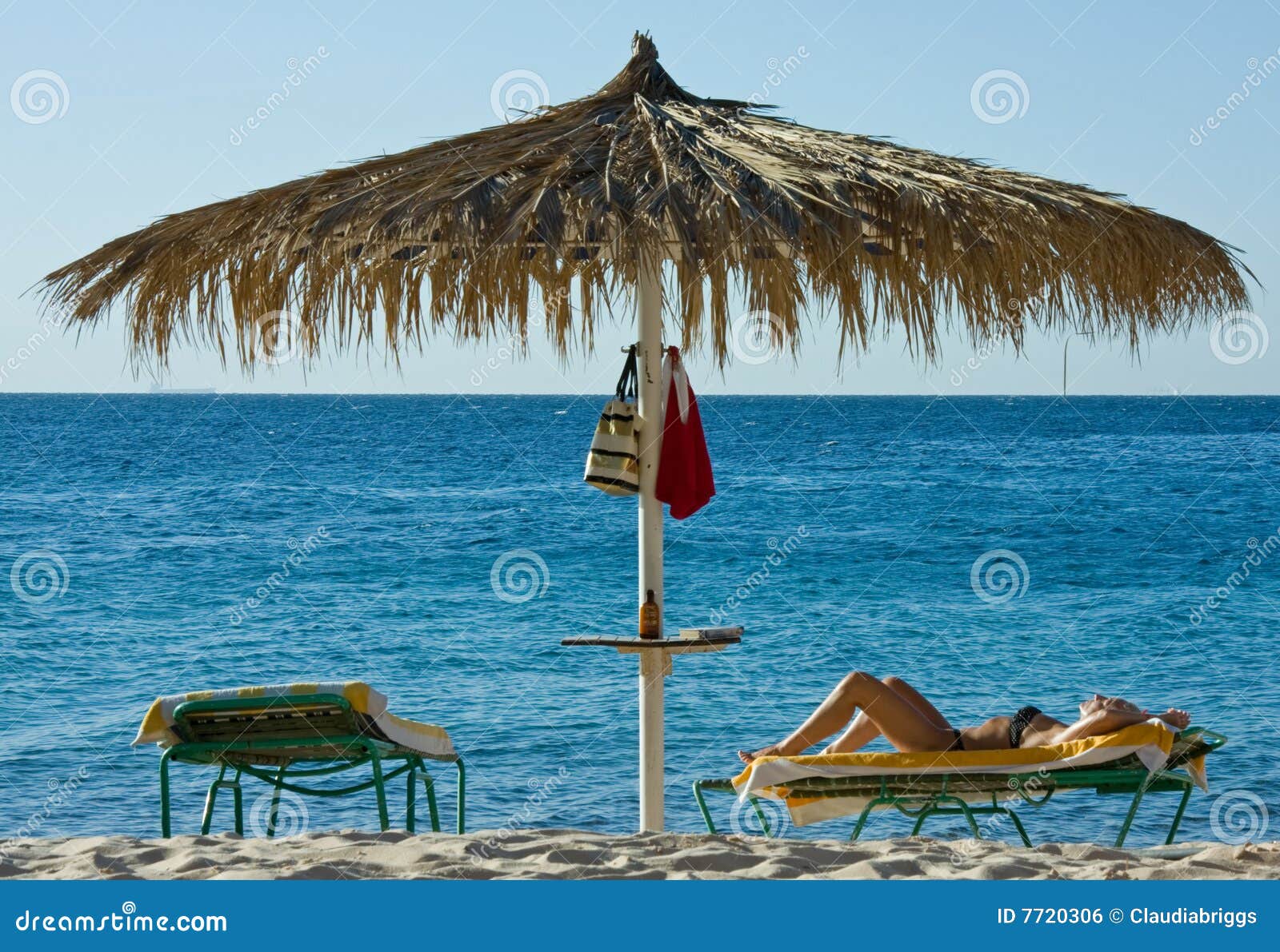 Woman Sunbathing stock photo. Image of holidays, morning 7720306