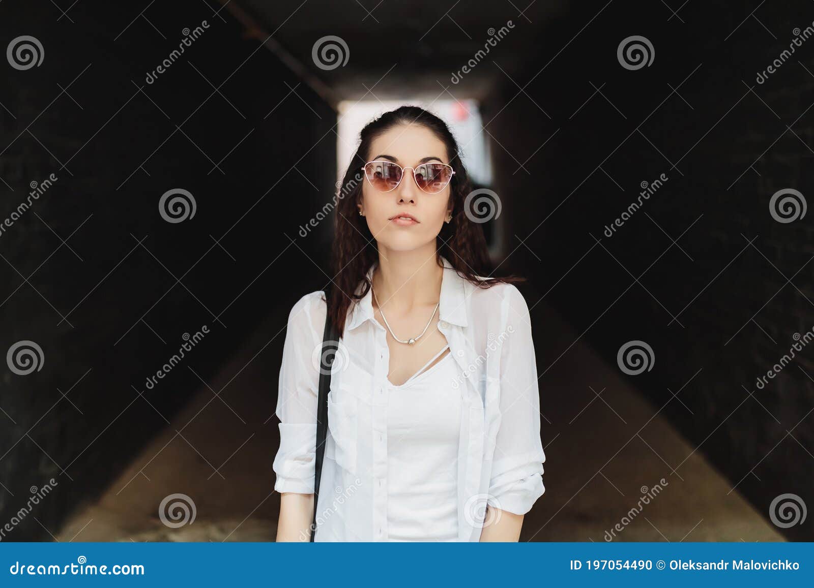 Woman in Sunglasses in a Dark Hallway. Stock Photo - Image of jacket ...