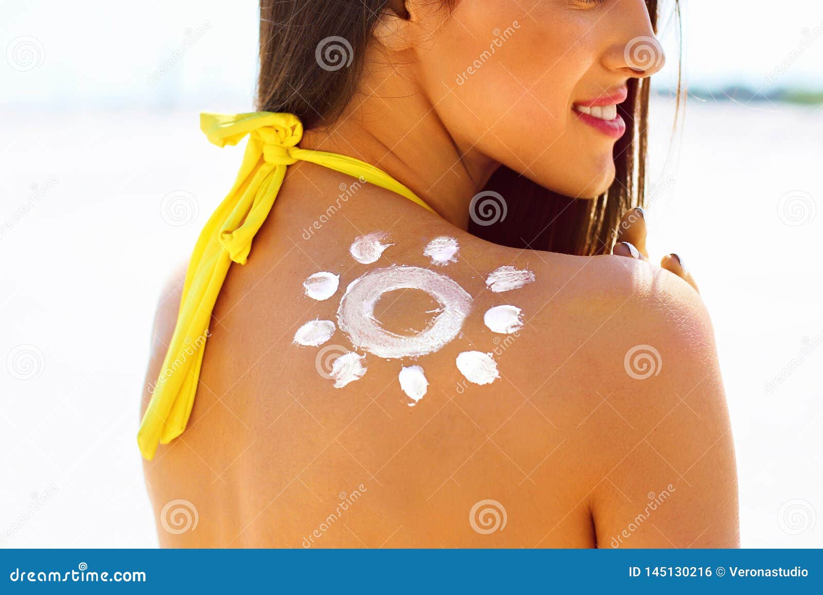 Woman with Suntan Lotion on Her Shoulder Stock Photo Image of lotion, shoulder 145130216