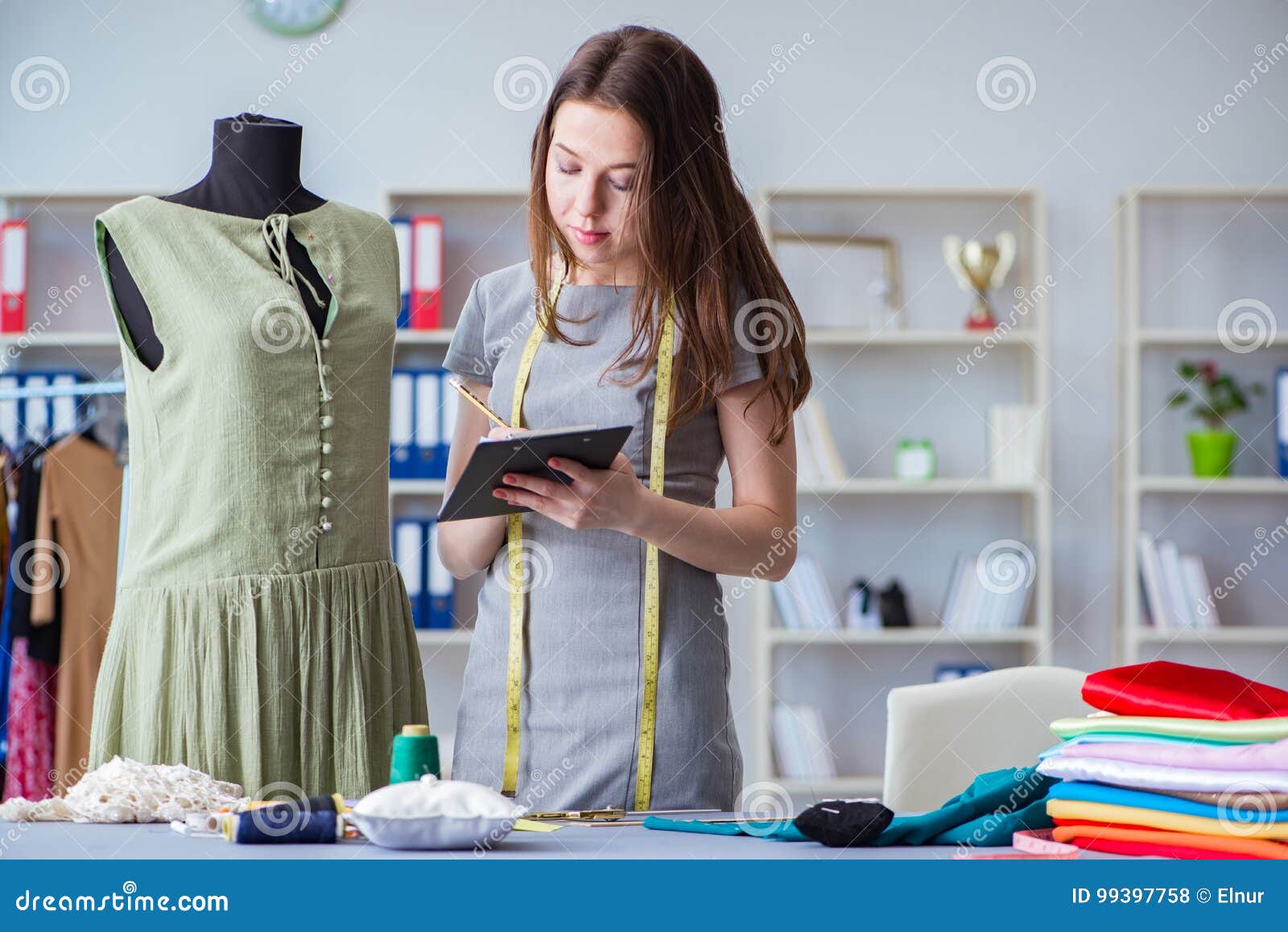 Woman Tailor Working on a Clothing Sewing Stitching Measuring Fa Stock ...