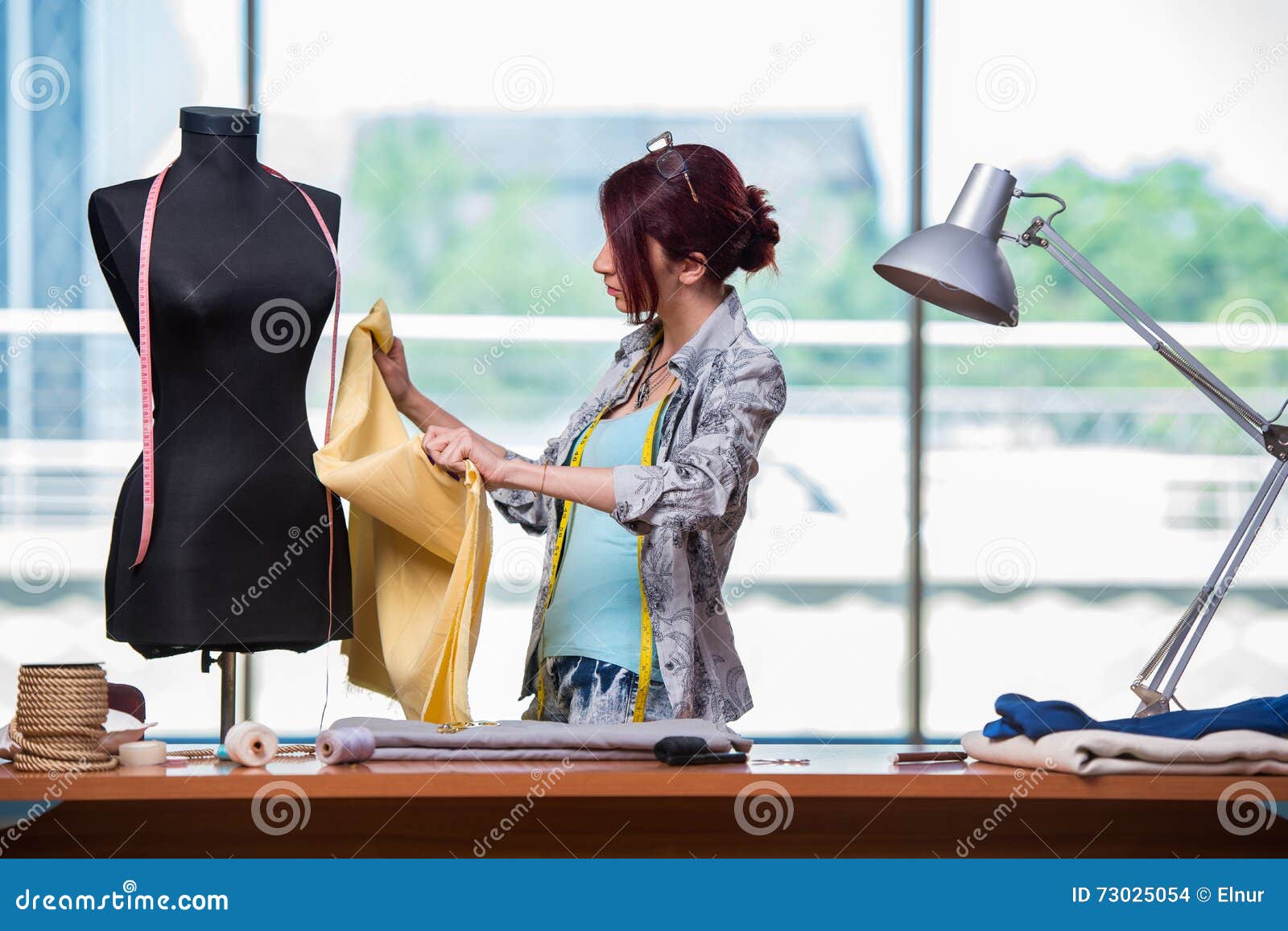 The Woman Tailor Working at Her Desk Stock Photo Image of meter