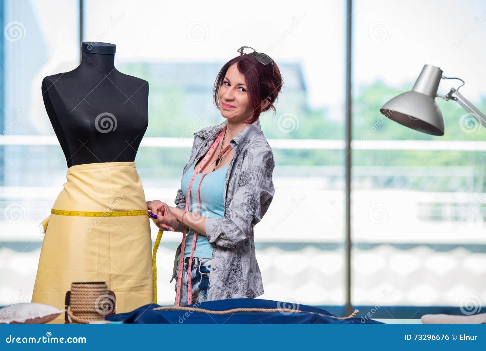 The Woman Tailor Working at Her Desk Stock Photo Image of equipment
