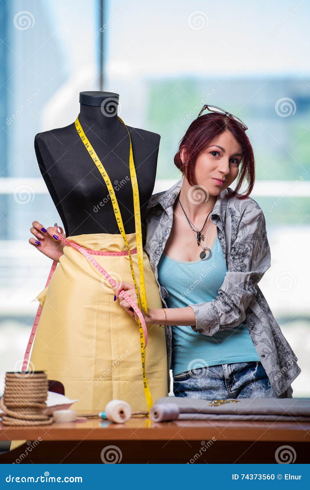 The Woman Tailor Working at Her Desk Stock Photo Image of meter