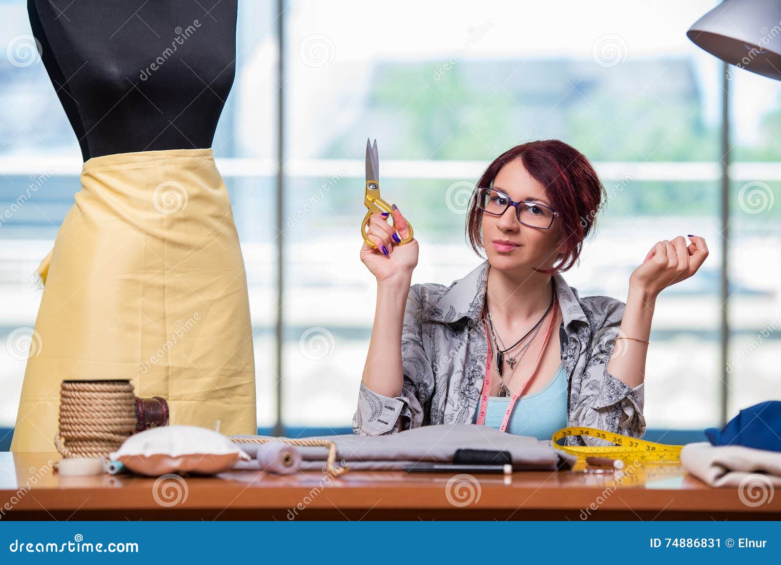 The Woman Tailor Working at Her Desk Stock Image Image of garment