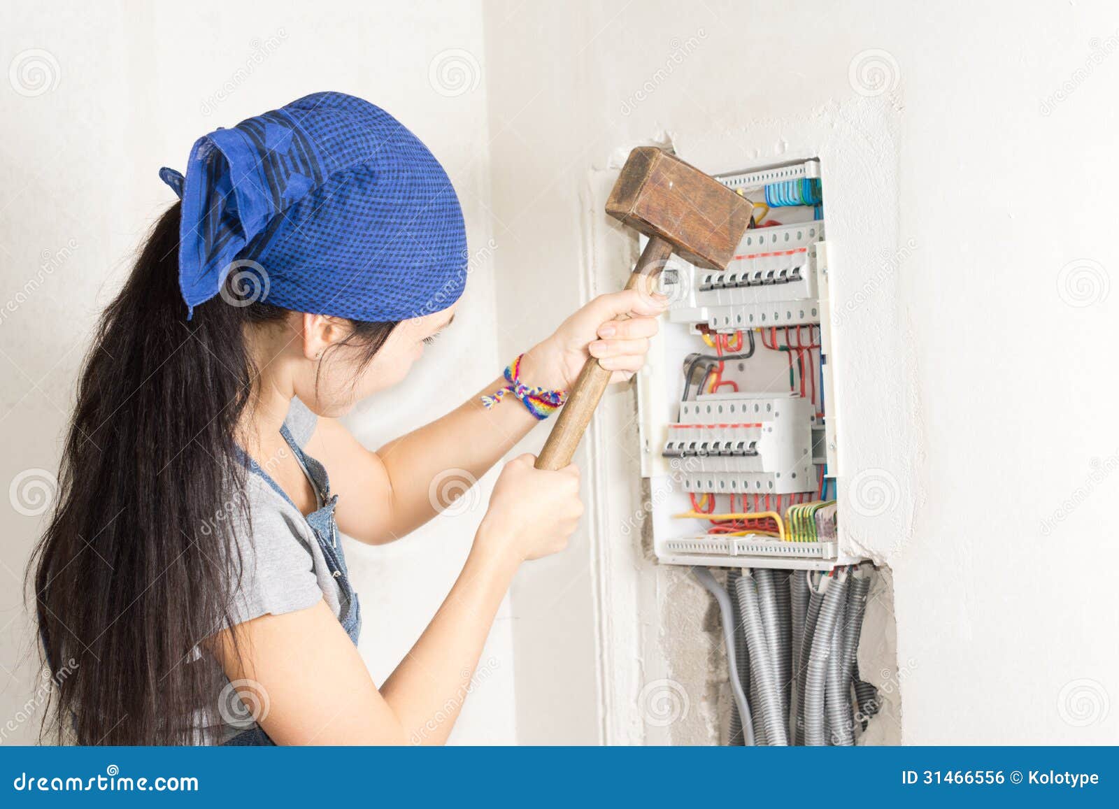 Woman Taking Aim at an Electrical Fuse Box Stock Photo - Image of fuse