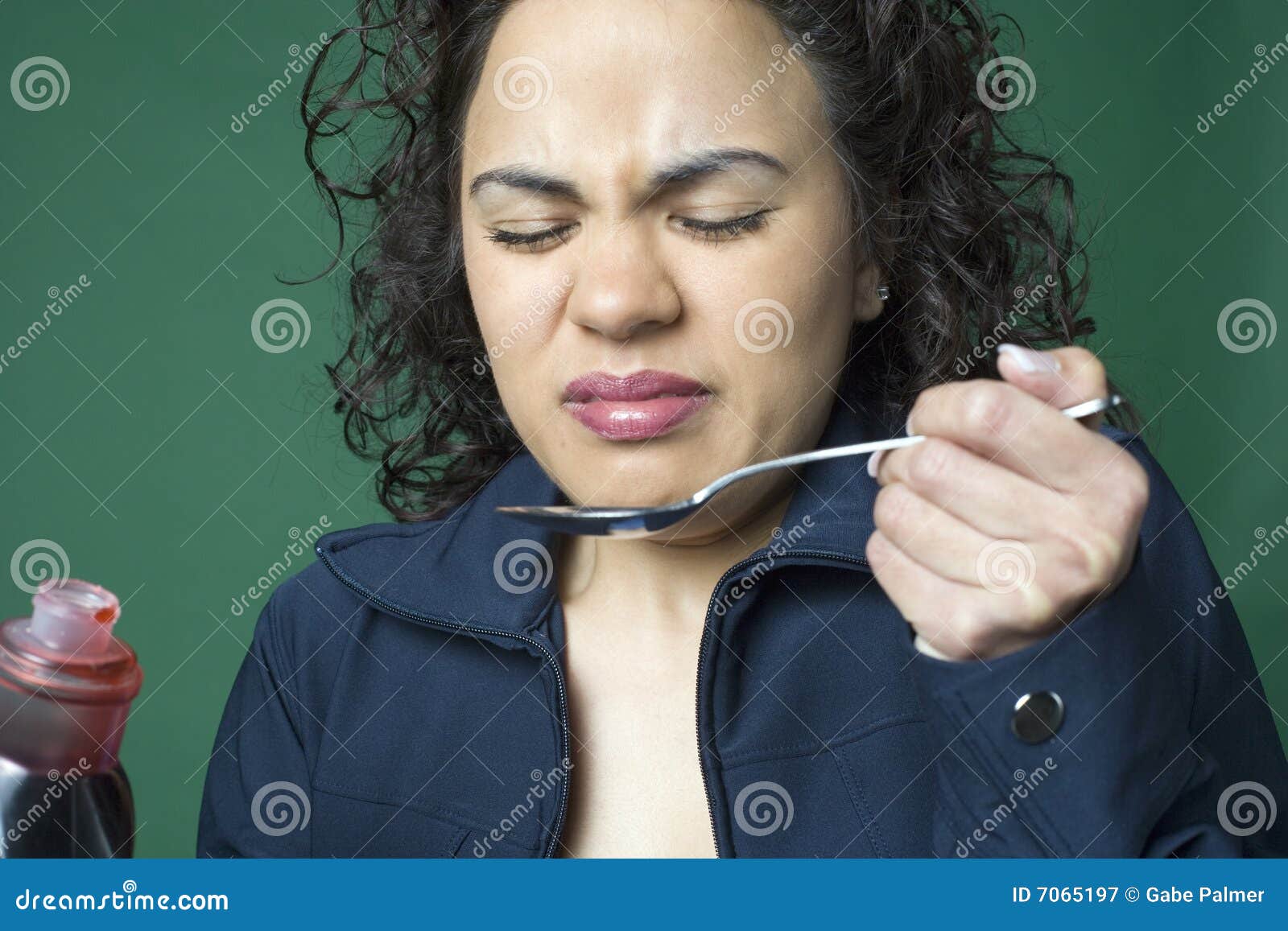 Woman Taking Bad Tasting Medicine Stock Image Image of spoon, studio
