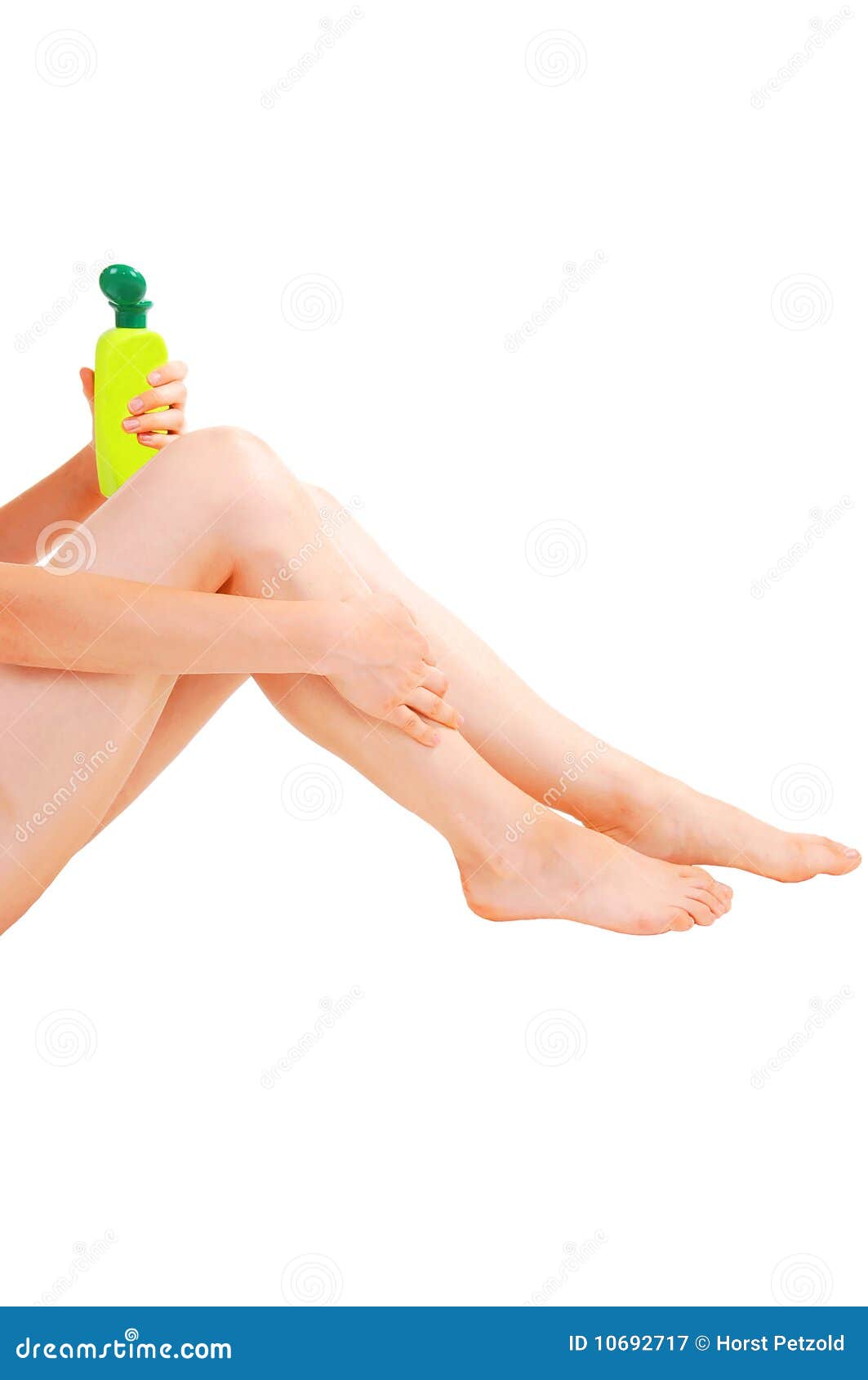 Pretty woman with a bottle between her legs Stock Photo