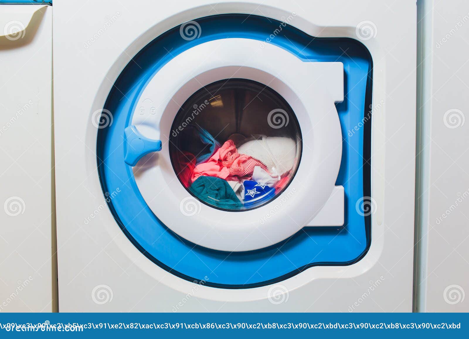 Woman Taking Color Clothes from Washing Machine. Stock Image Image of