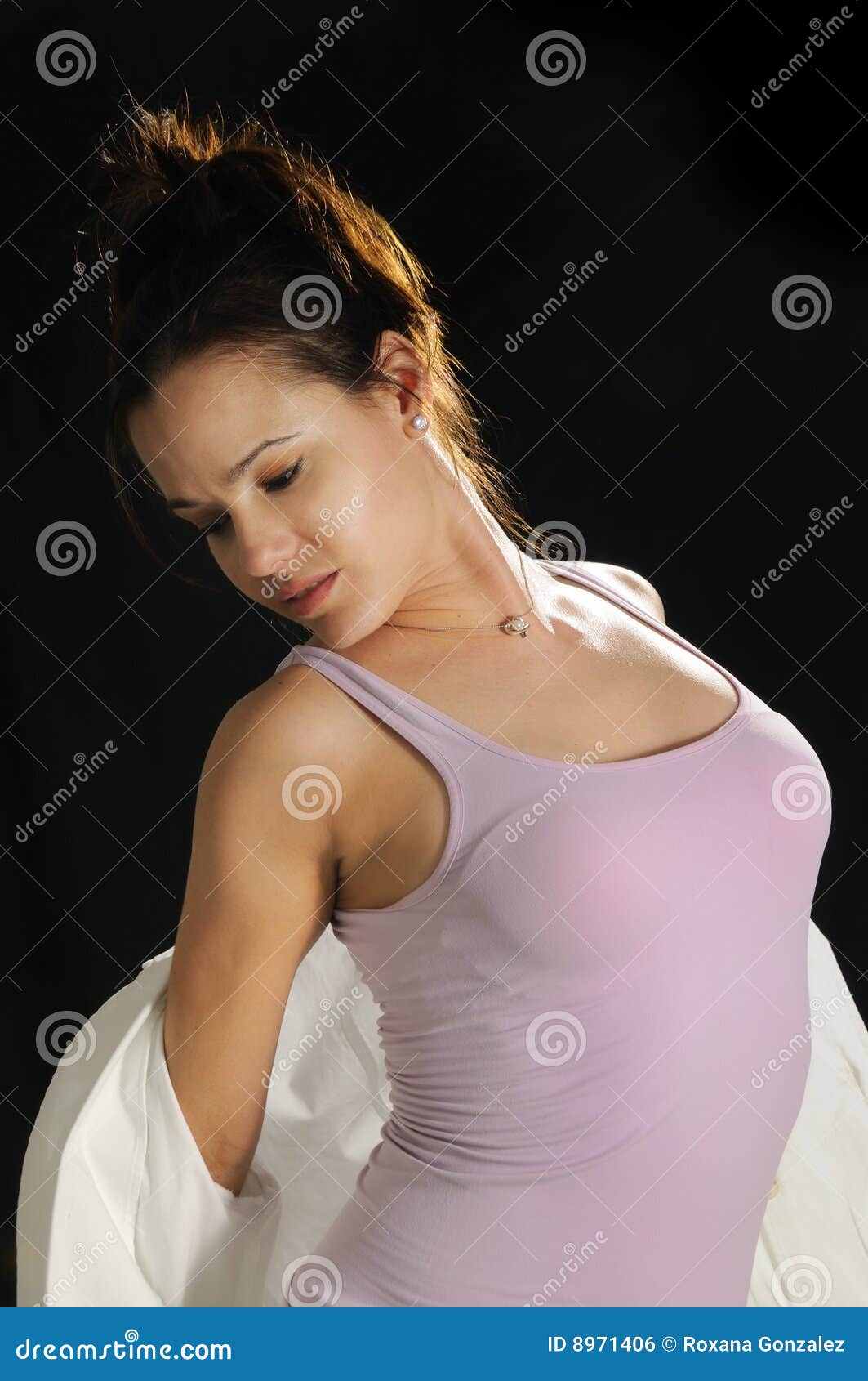 Woman taking off clothes stock photo. Image of jacket - 8971406