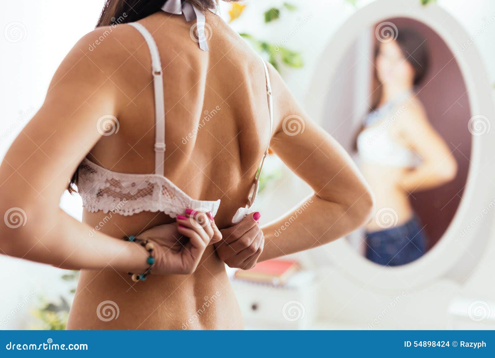 https://thumbs.dreamstime.com/z/woman-taking-off-her-bra-closeup-back-view-unhooking-clasp-white-looking-mirror-54898424.jpg