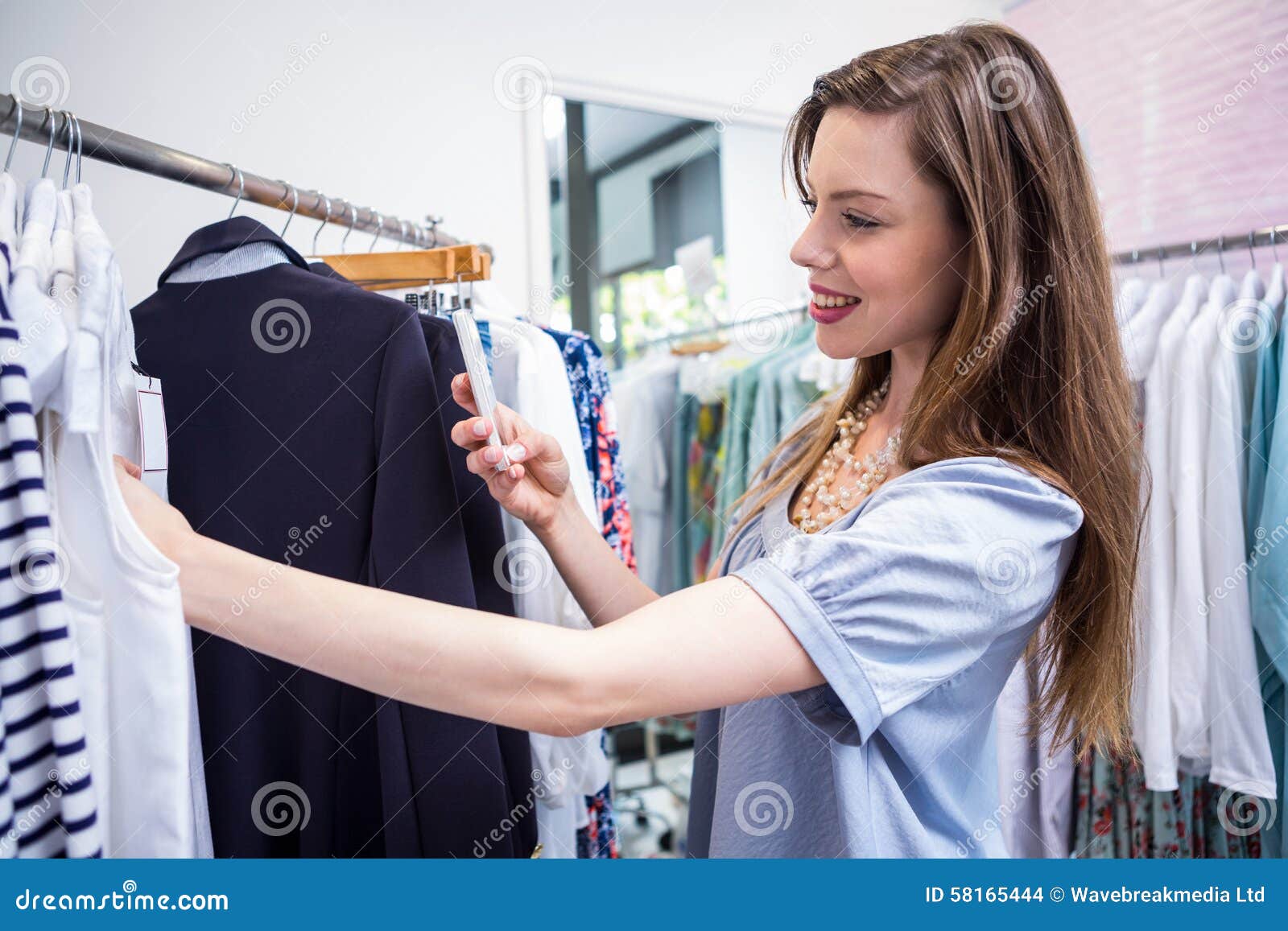 Woman Taking a Photo of Price Tag Stock Photo - Image of pretty, female ...