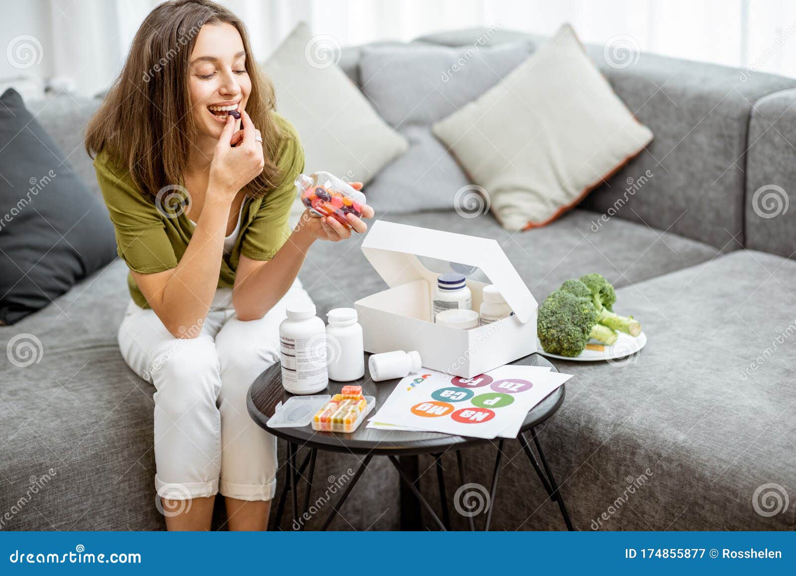 woman taking vitamins or nutritional supplements