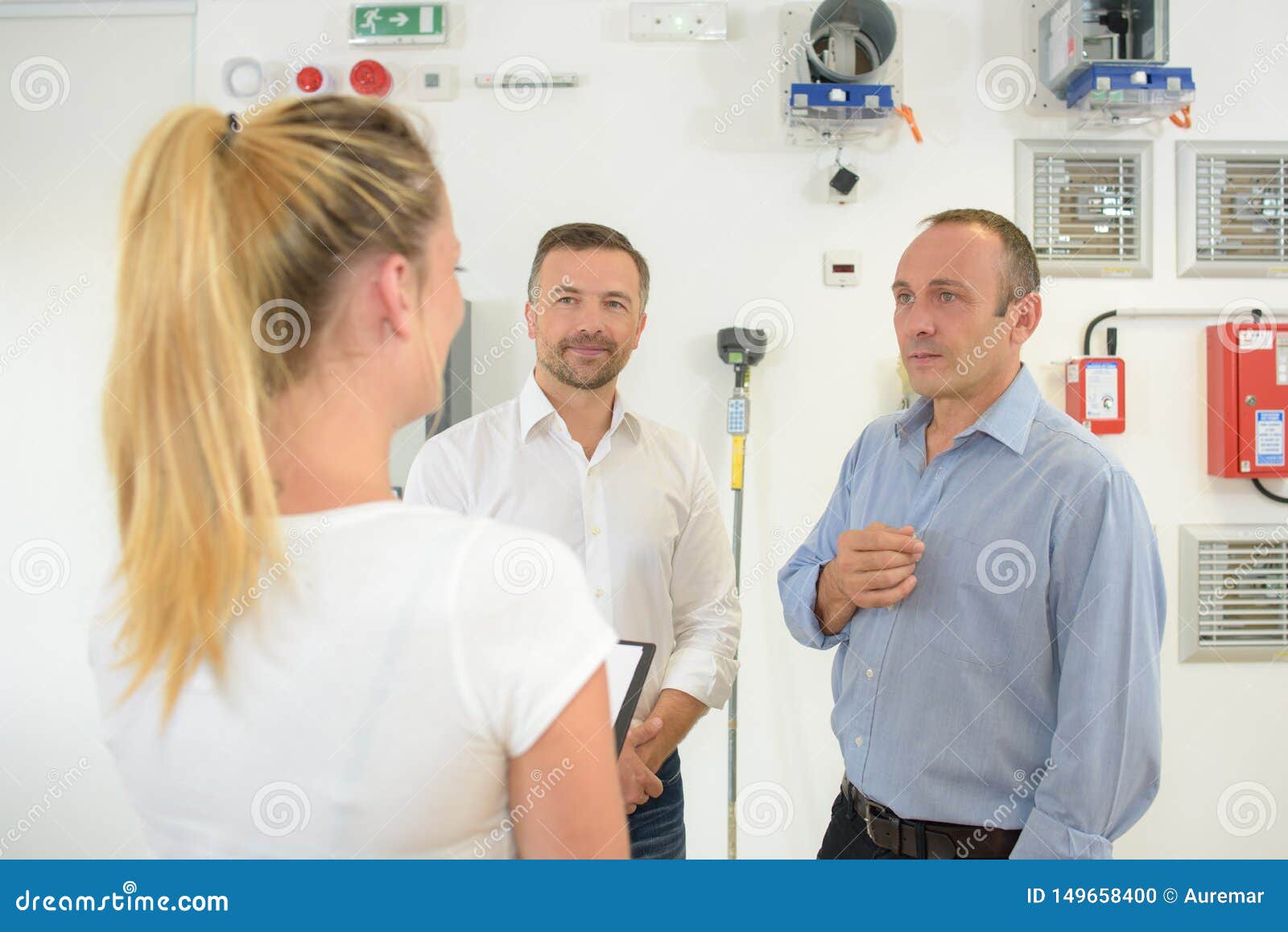 https://thumbs.dreamstime.com/z/woman-talking-to-two-men-149658400.jpg