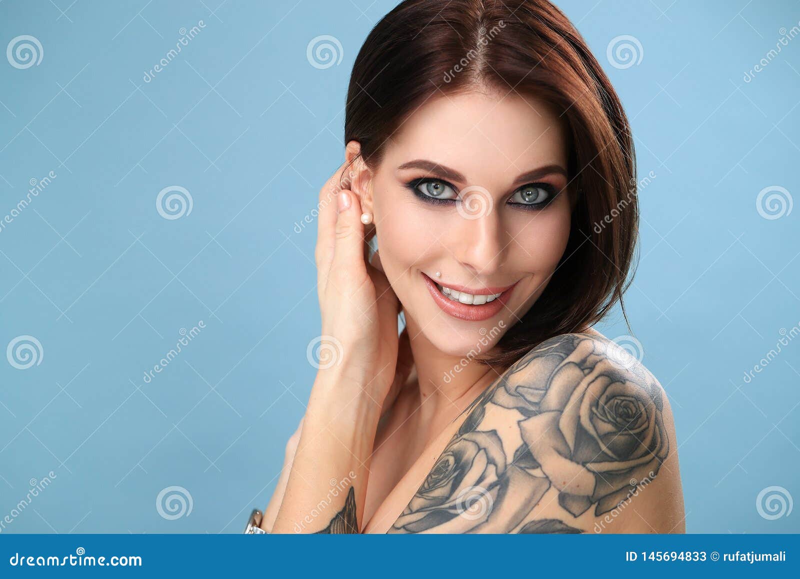 Portrait of Bald Woman with Tattoos Screaming · Free Stock Photo