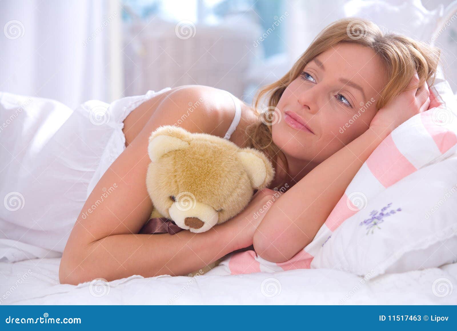 Woman With Teddy Bear In Bed Stock Photos - Image: 11517463
