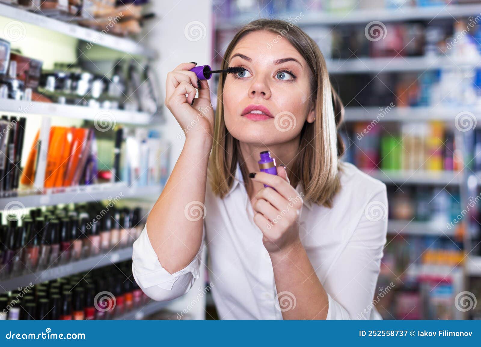 Woman Testing Mascara in Store Stock Image Image of shopper